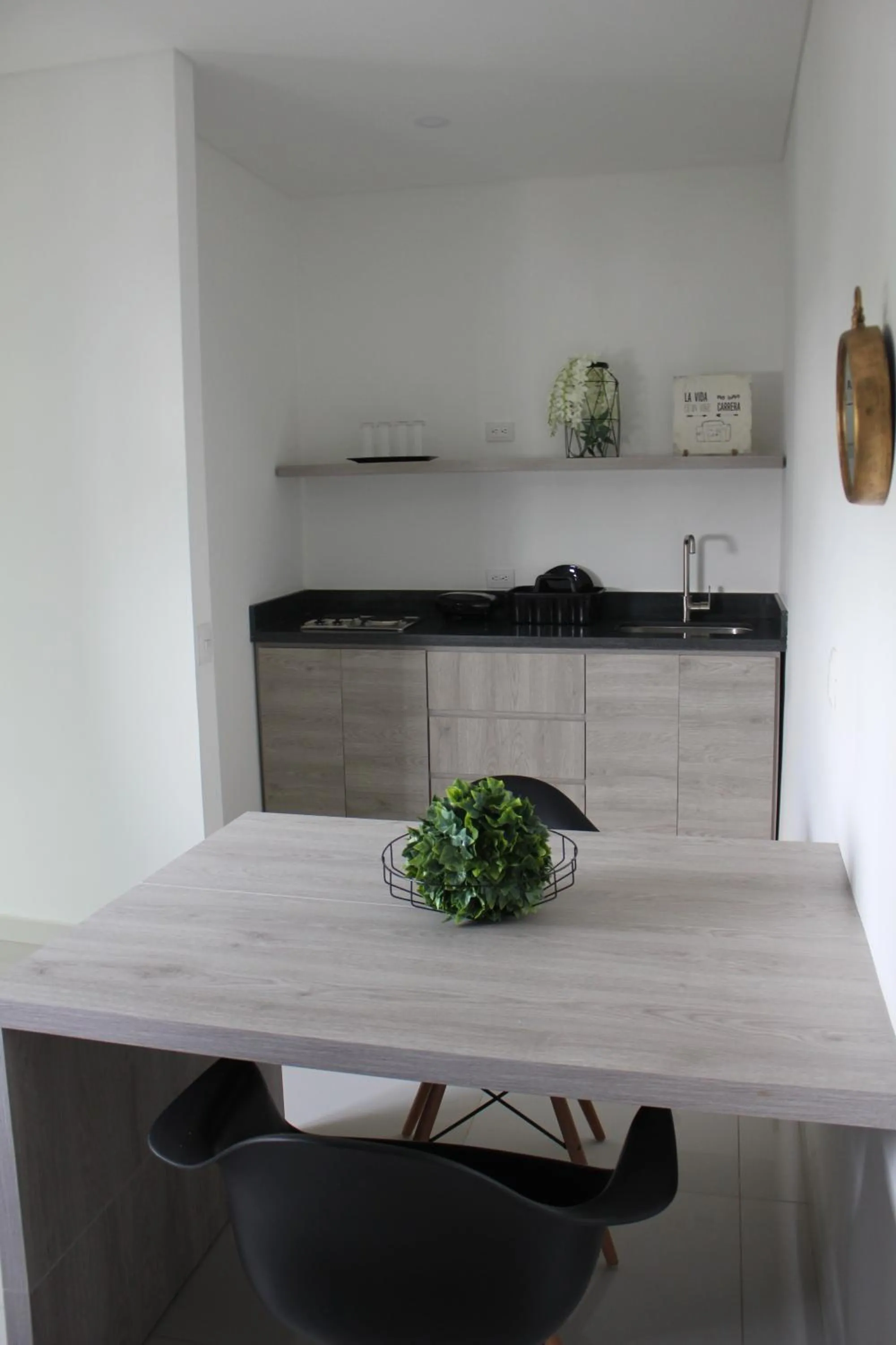 Kitchen or kitchenette in Hotel Sexta Avenida Inn