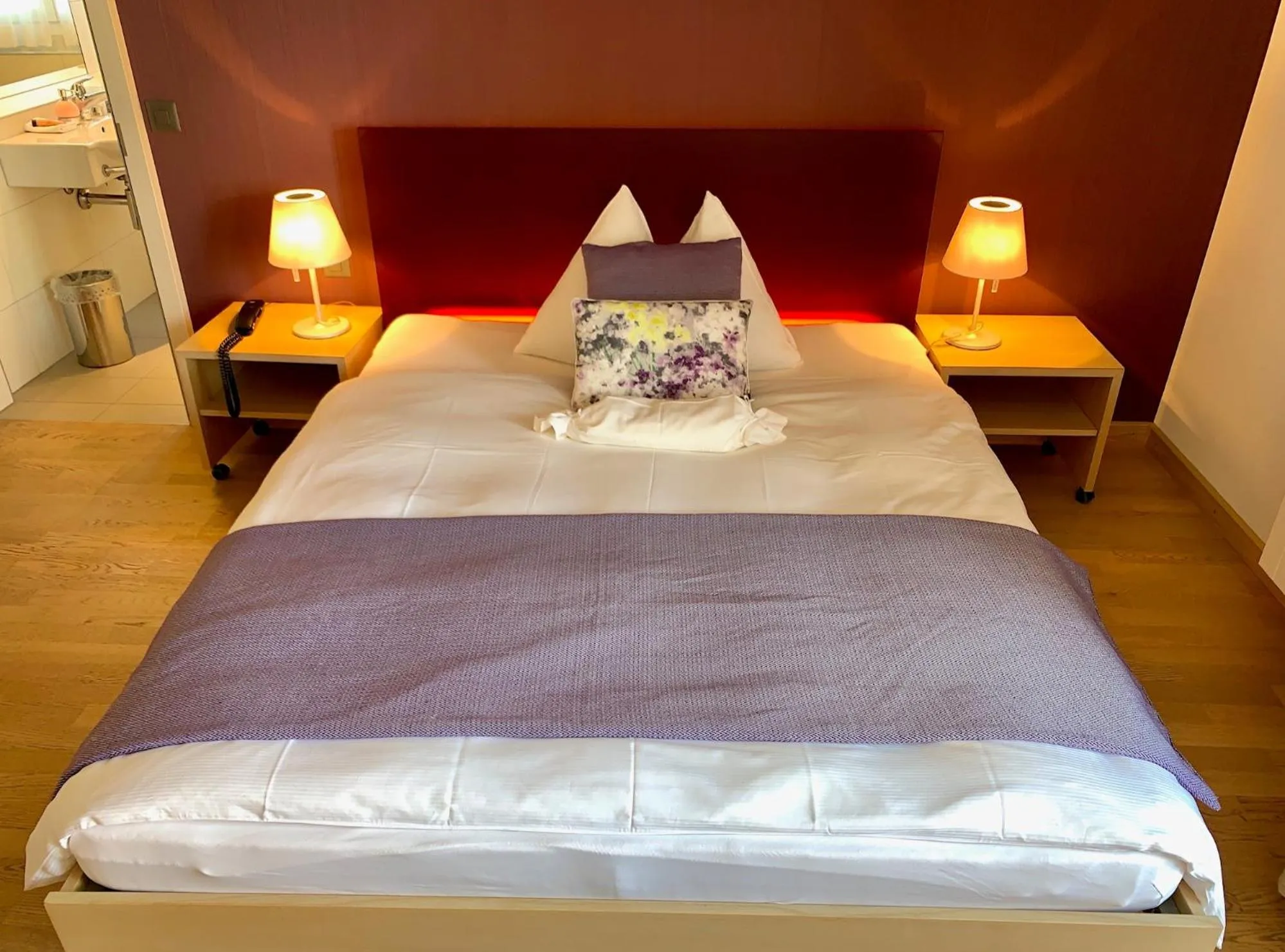 Bed in Hotel Jean-Jacques Rousseau