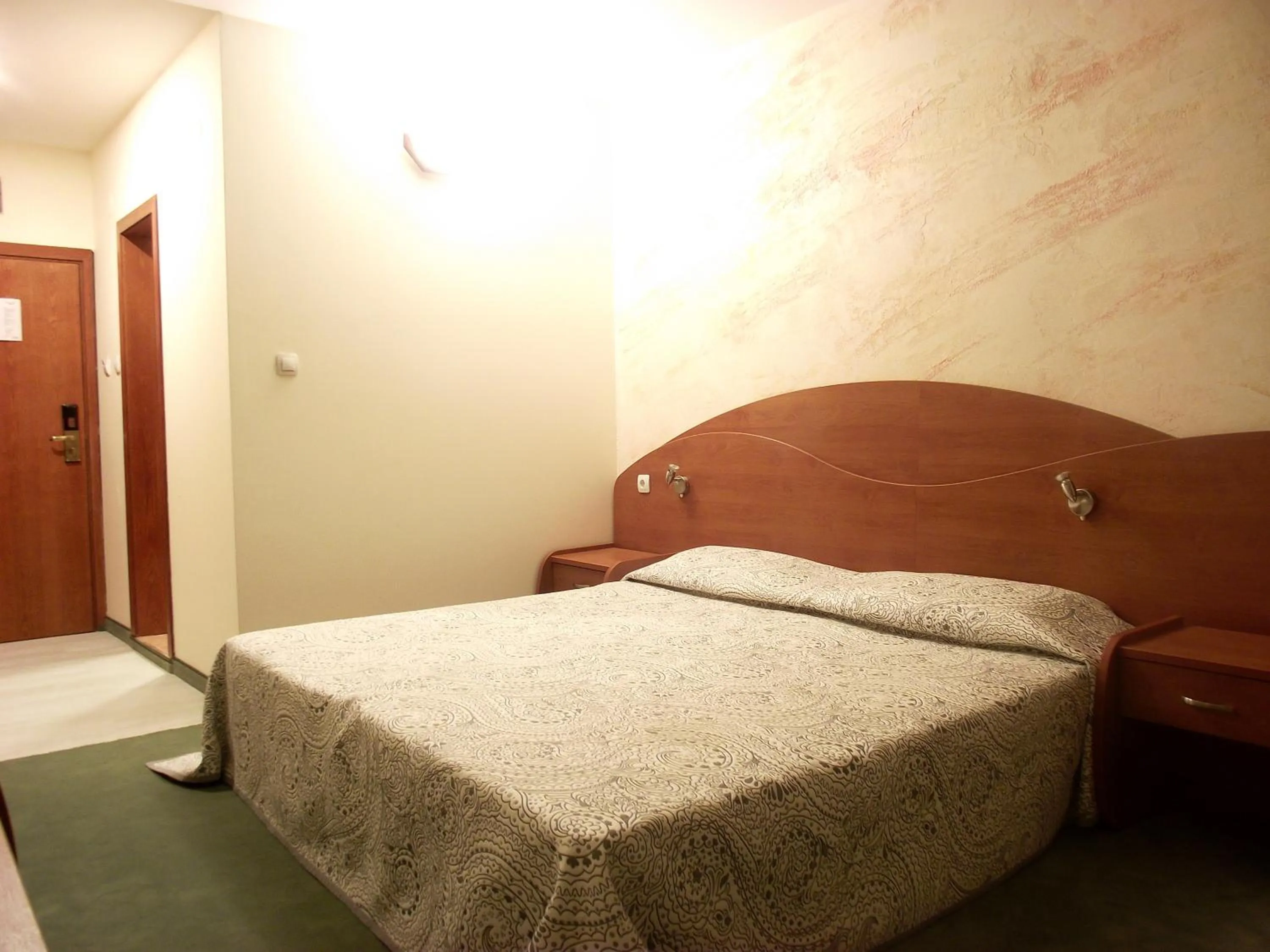 Bed in Elegant Hotel