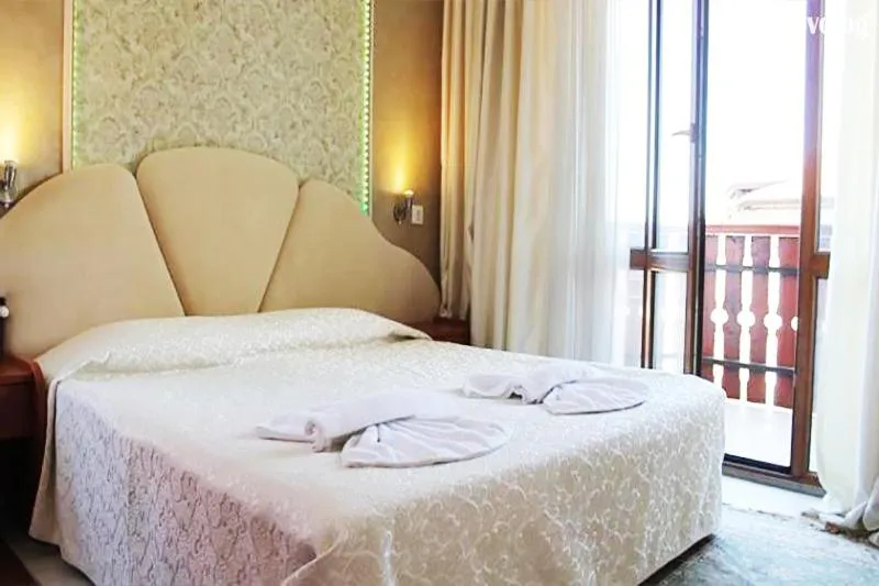 Bed in Elegant Hotel