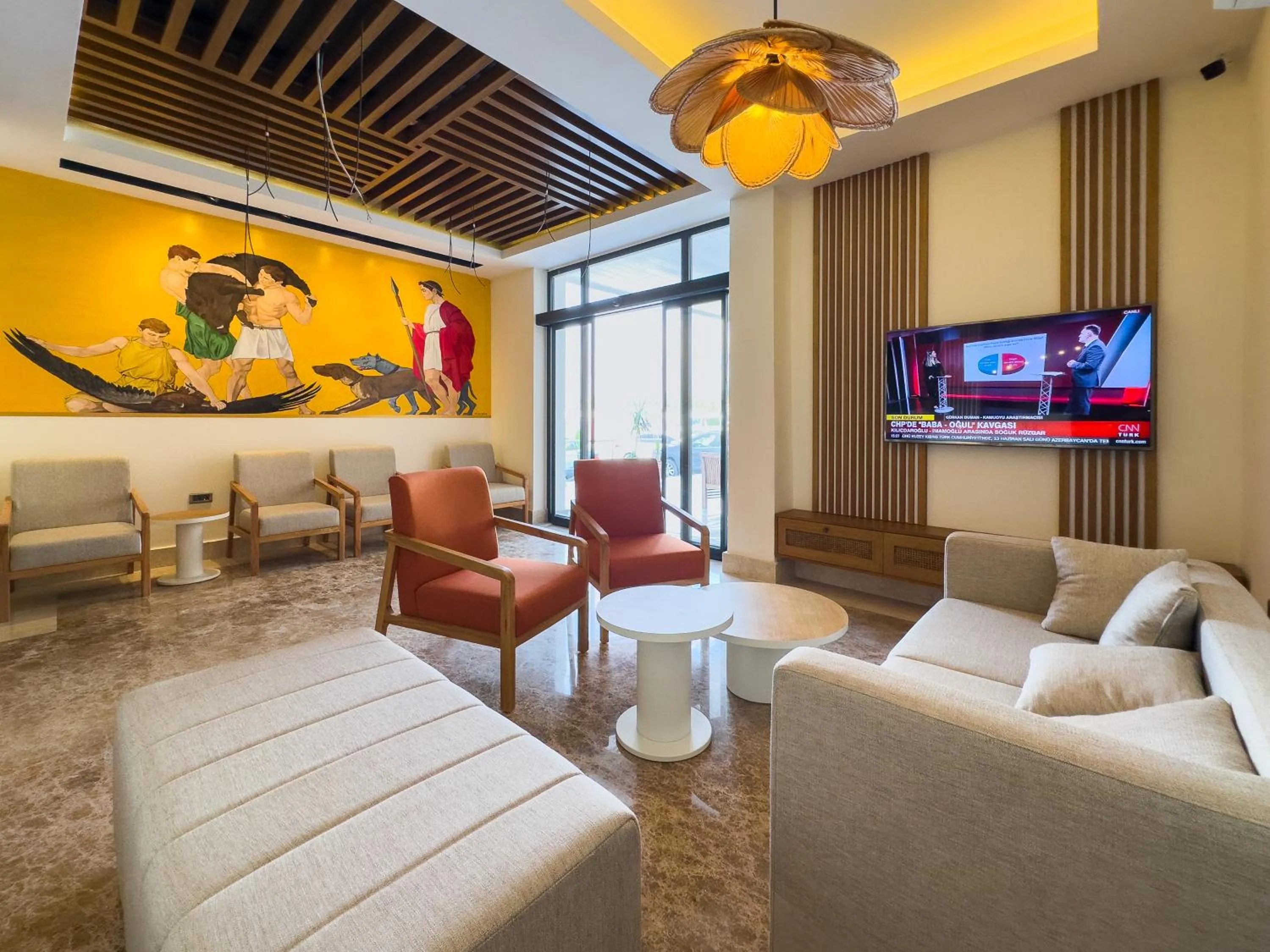 Communal lounge/ TV room in Dedeoğlu Port Hotel
