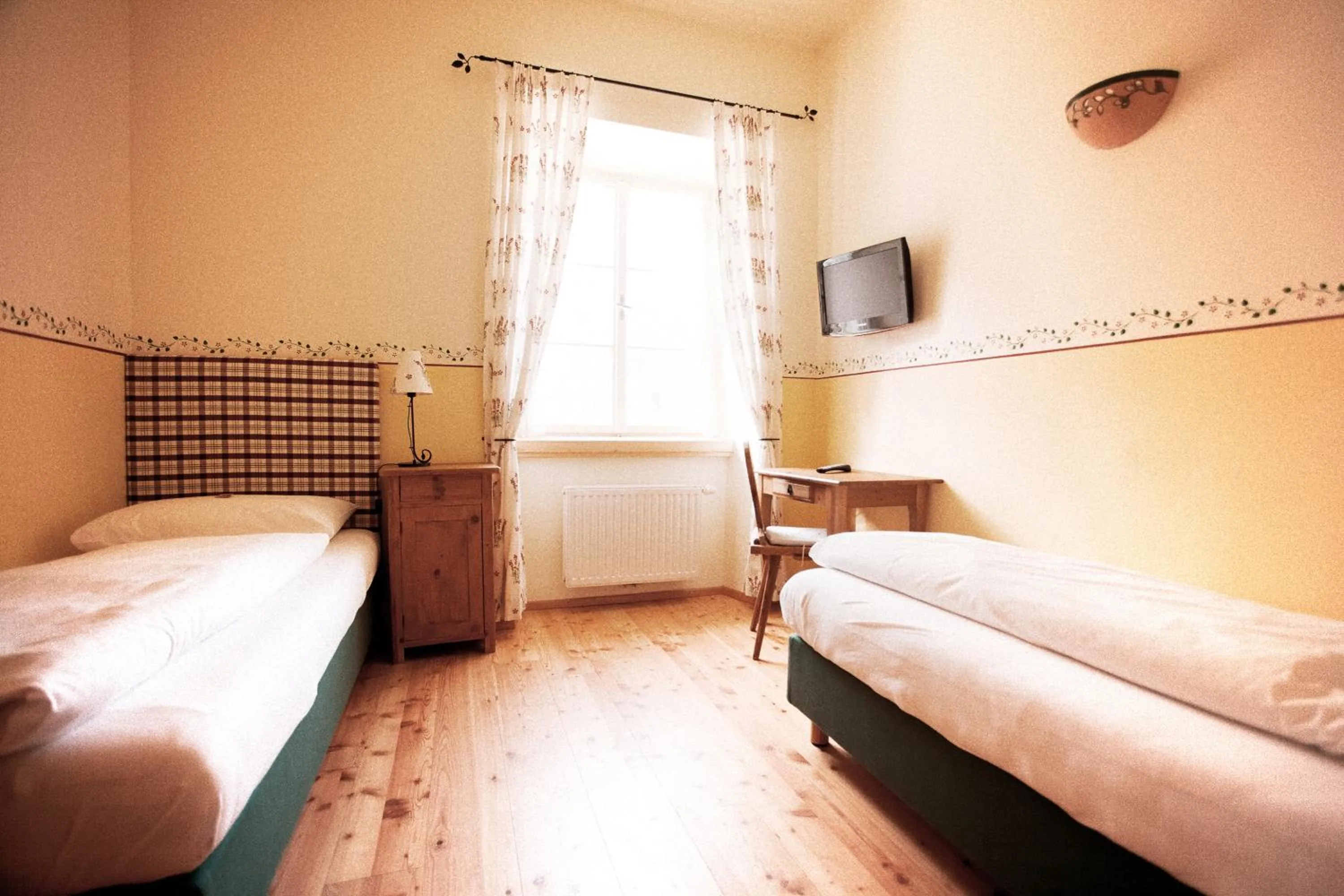 Photo of the whole room, Bed in Hotel-Gasthof Weitgasser