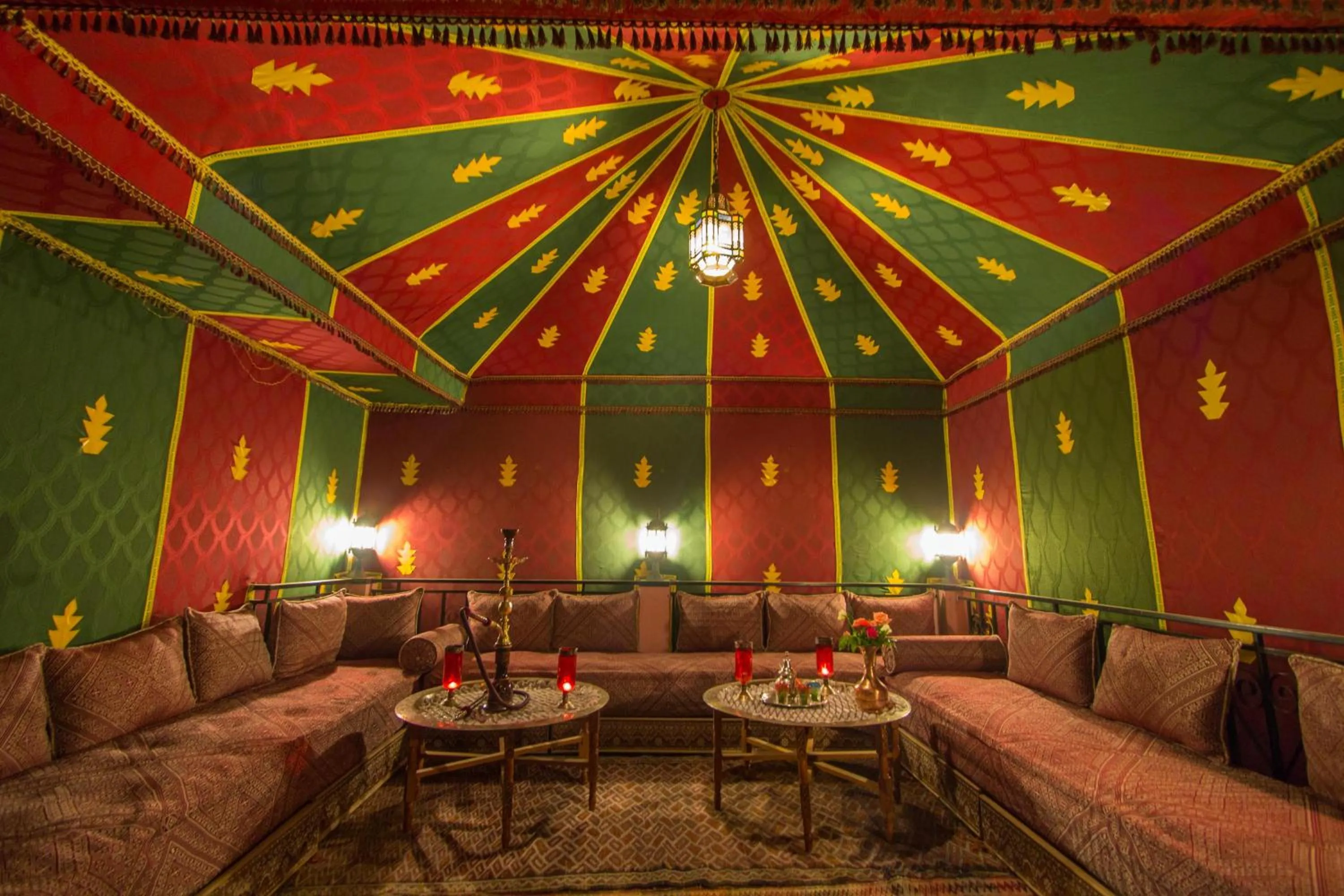 Communal lounge/ TV room in Riad Jardin Chrifa