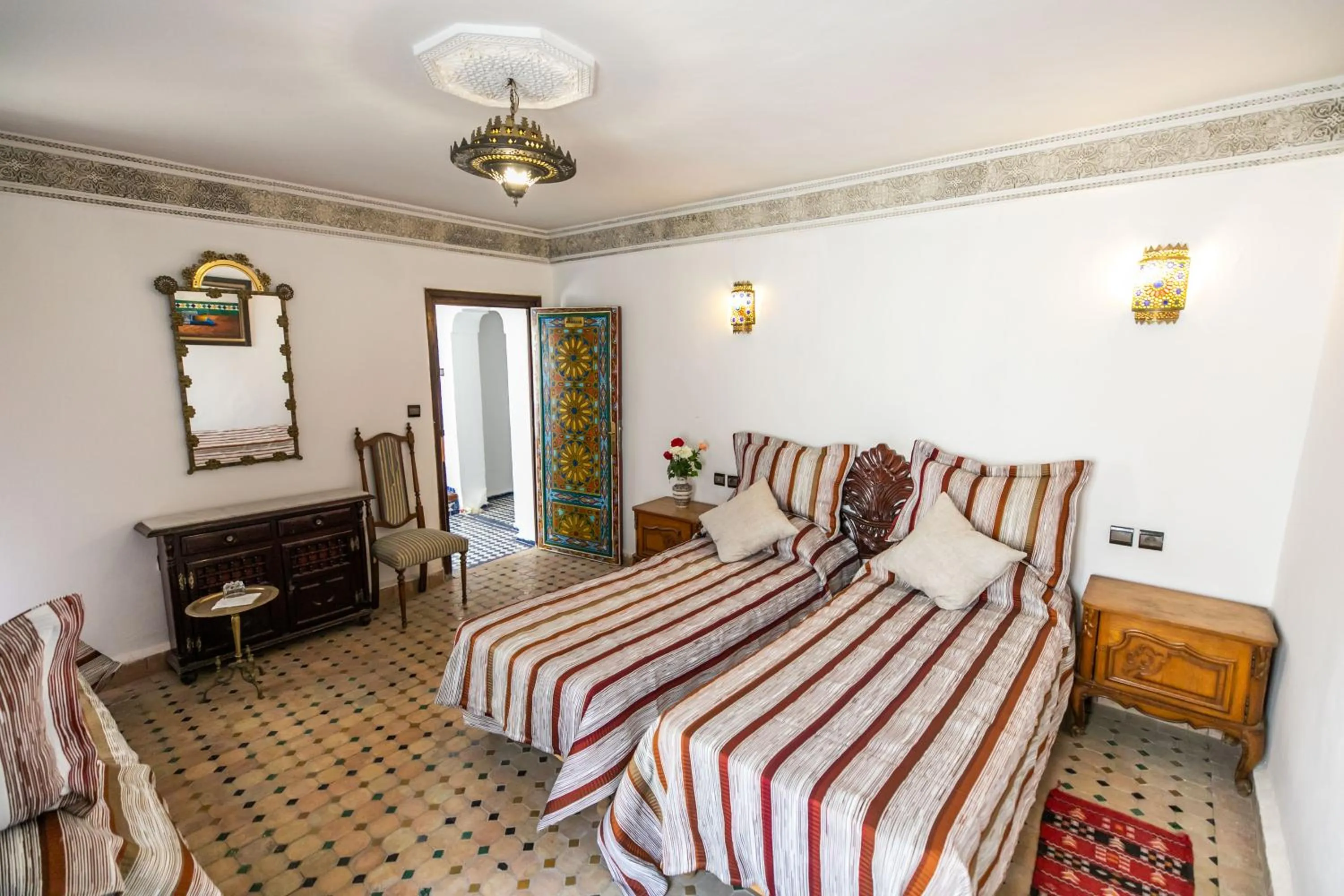 Bed in Riad Jardin Chrifa