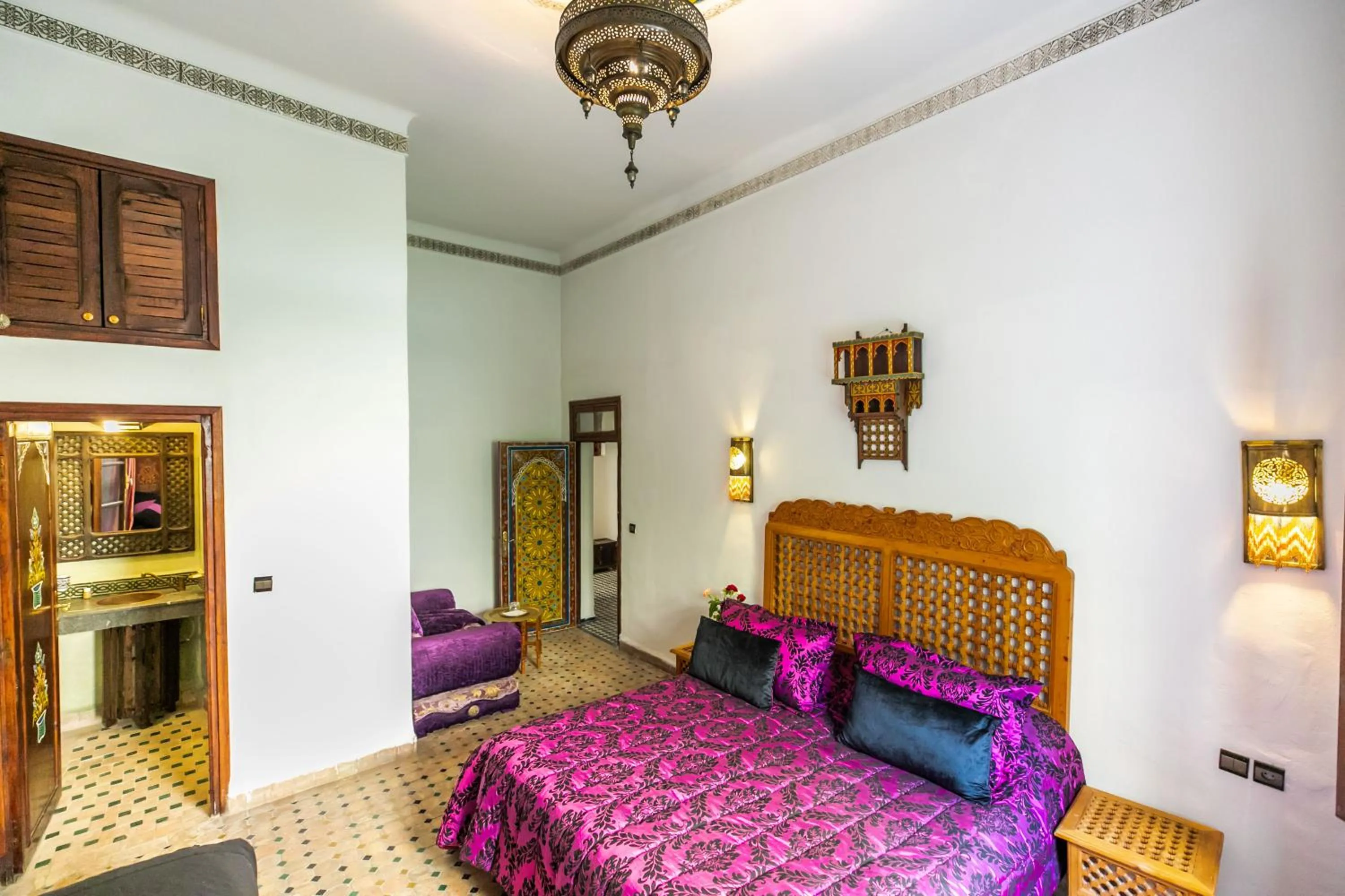 Bed in Riad Jardin Chrifa