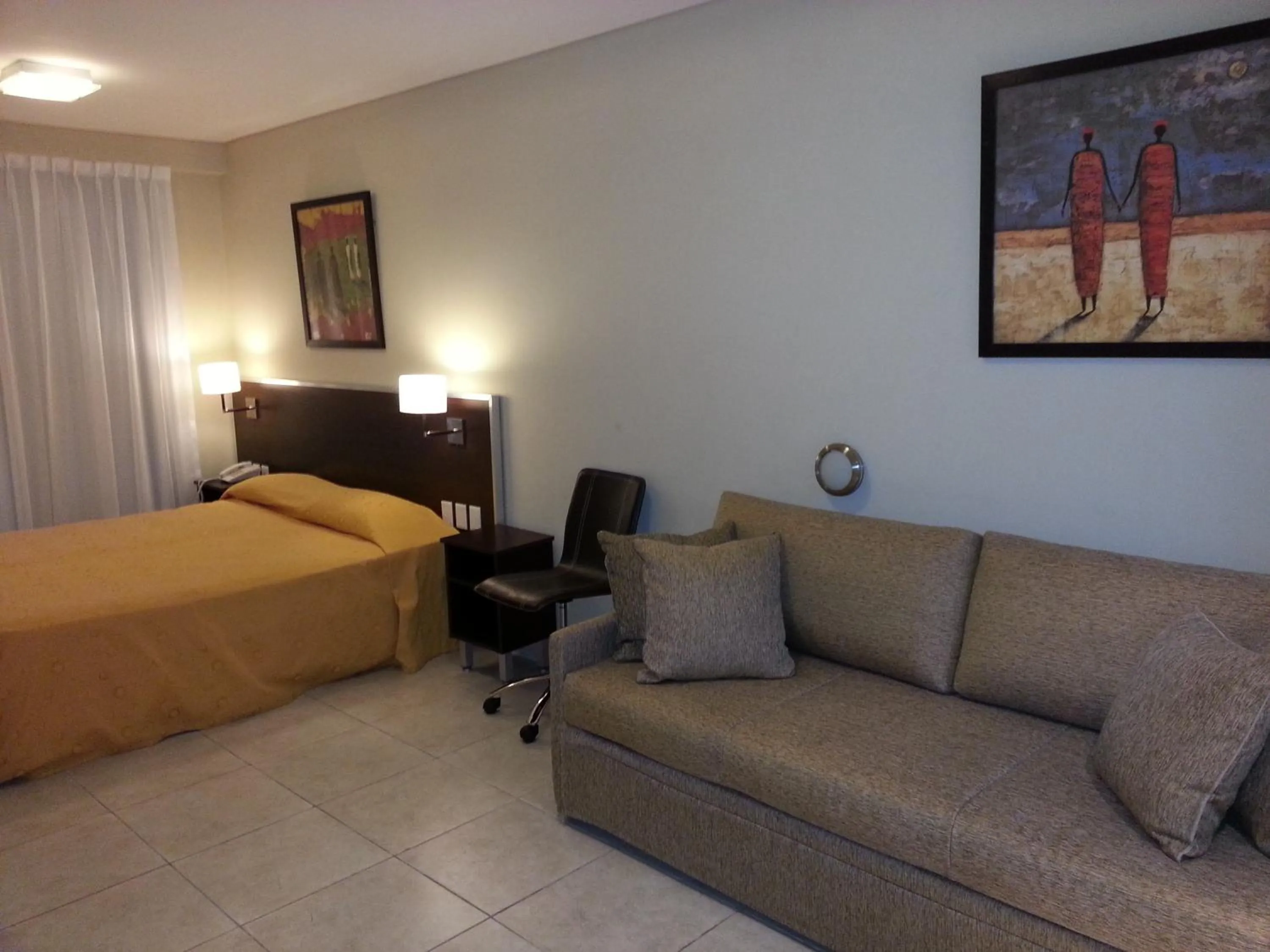 Living room, Bed in Hotel Nontue Abasto Buenos Aires