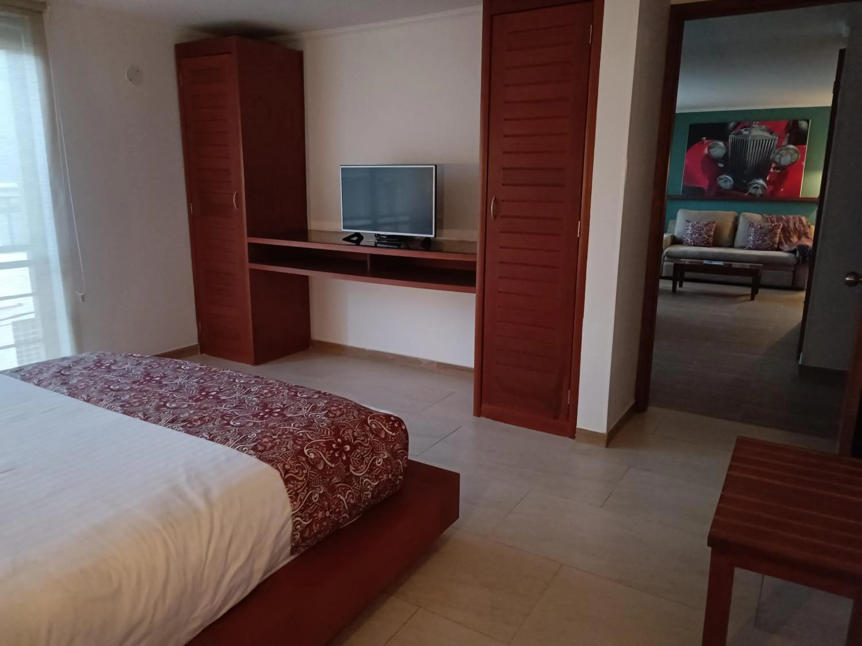 Bed in Hotel Boutique Confort Suites