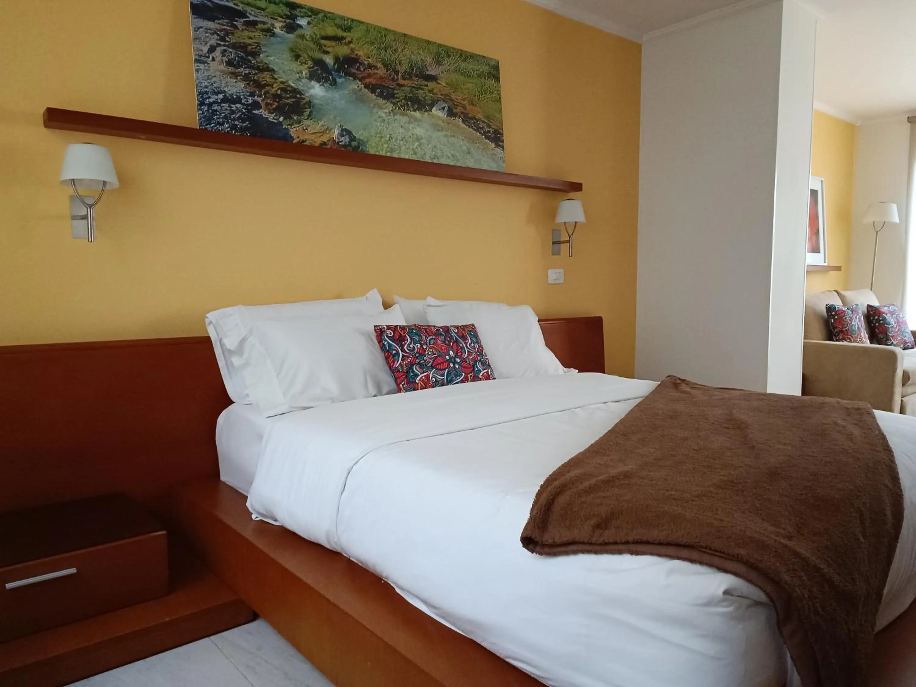 Bed in Hotel Boutique Confort Suites