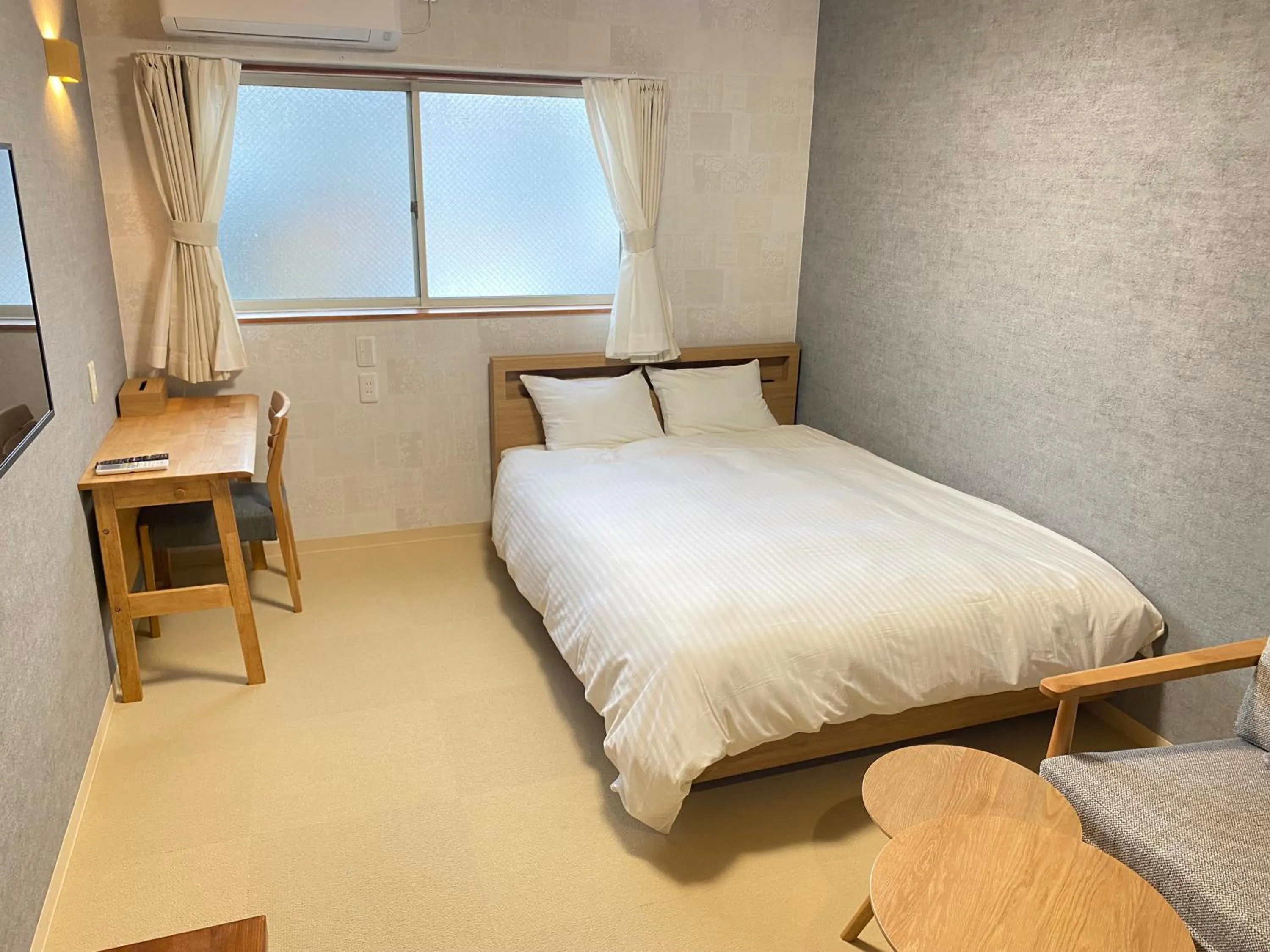 Bed in ETAVIA Yufuinekimae