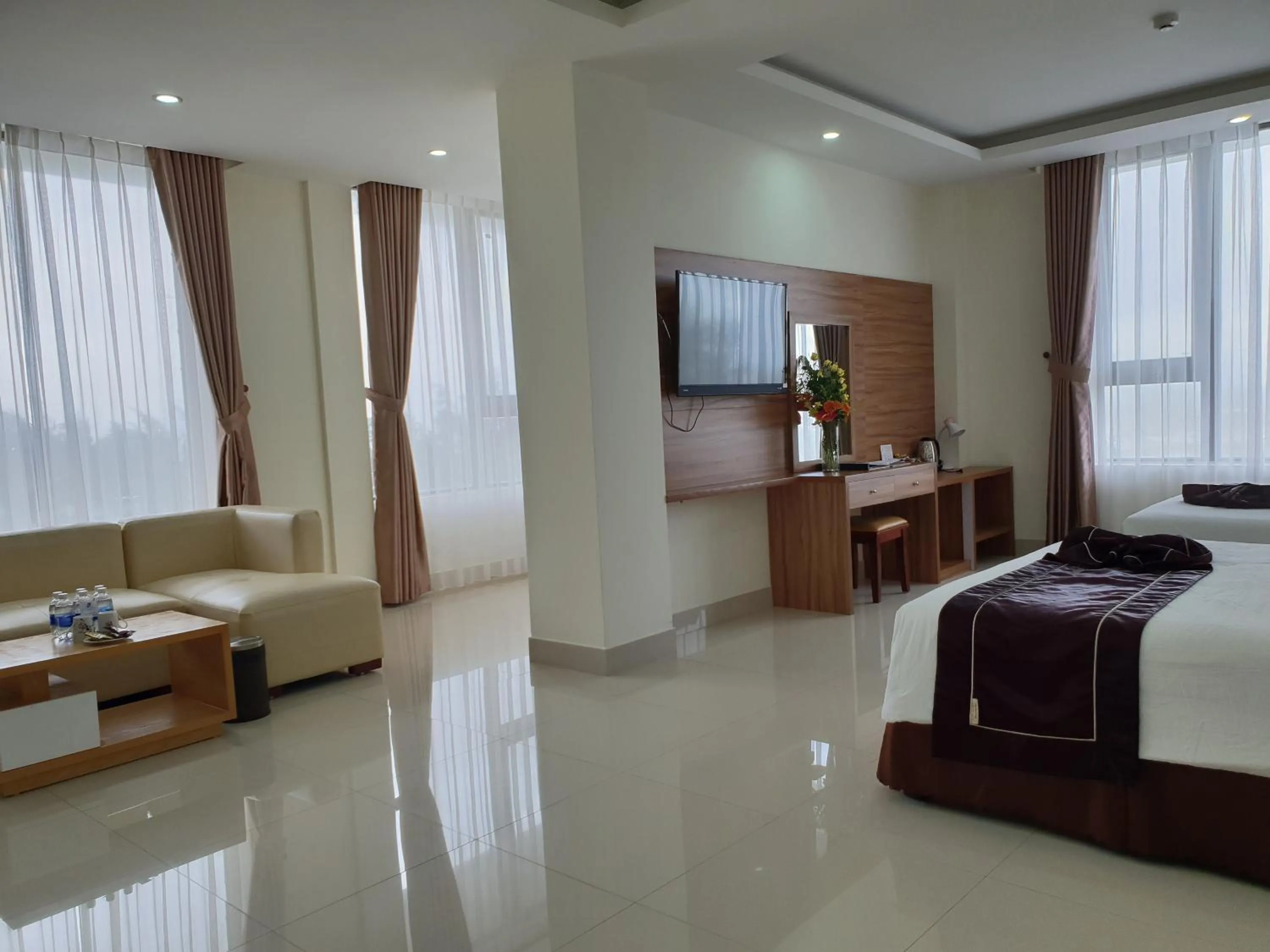 Living room, Bed in Phu Cuong Beach Hotel