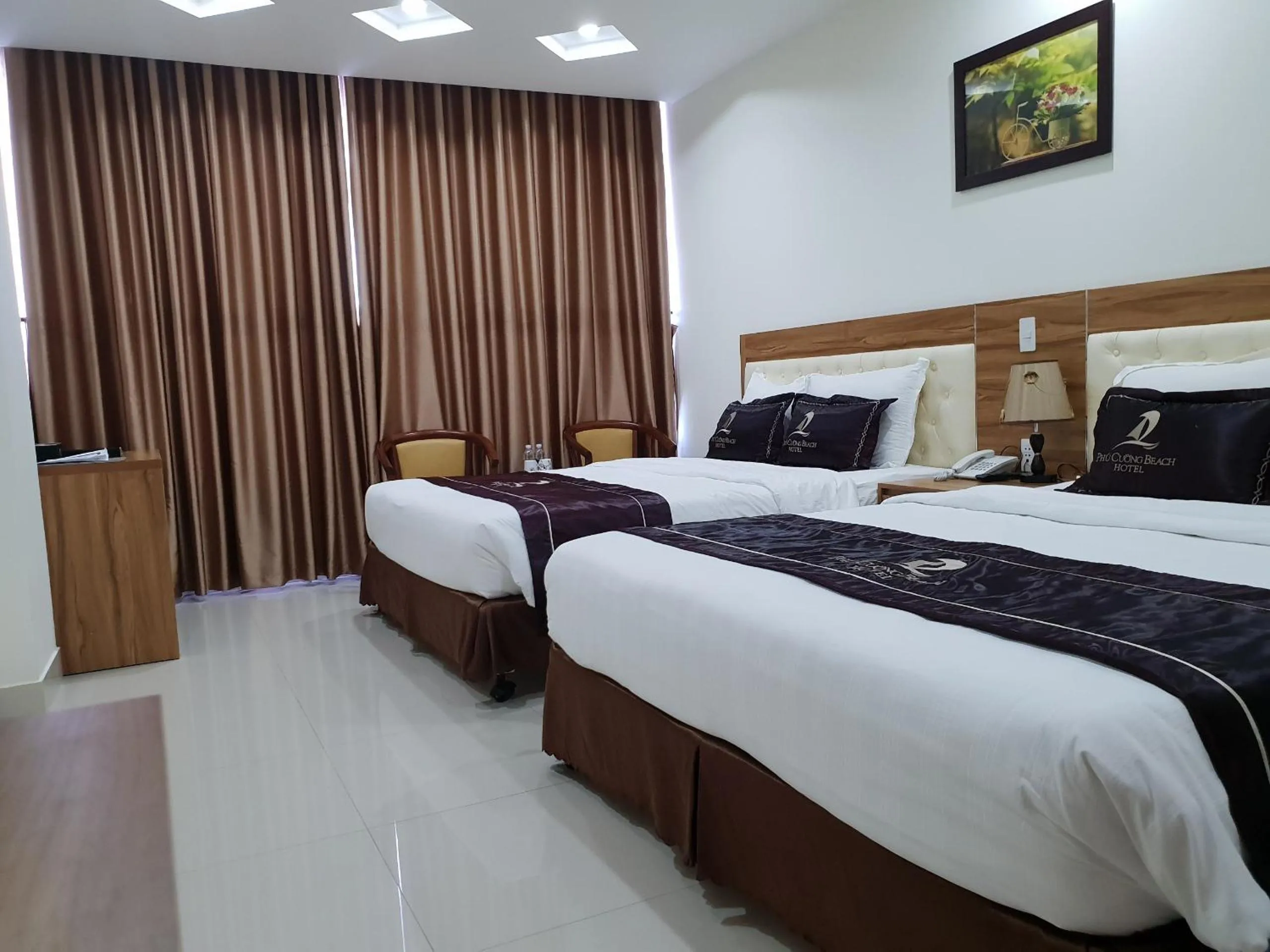 Bed in Phu Cuong Beach Hotel