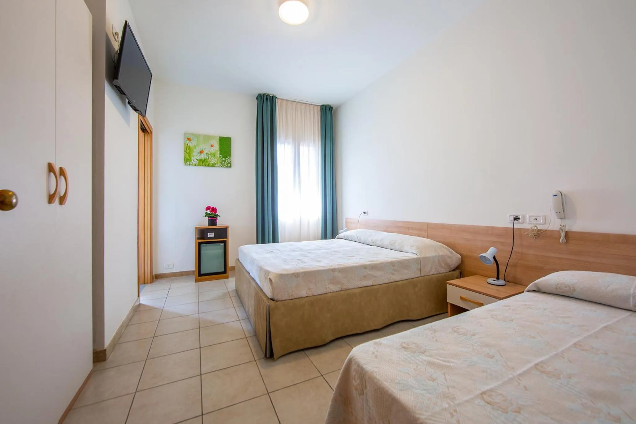 Photo of the whole room, Bed in Hotel Ginevra