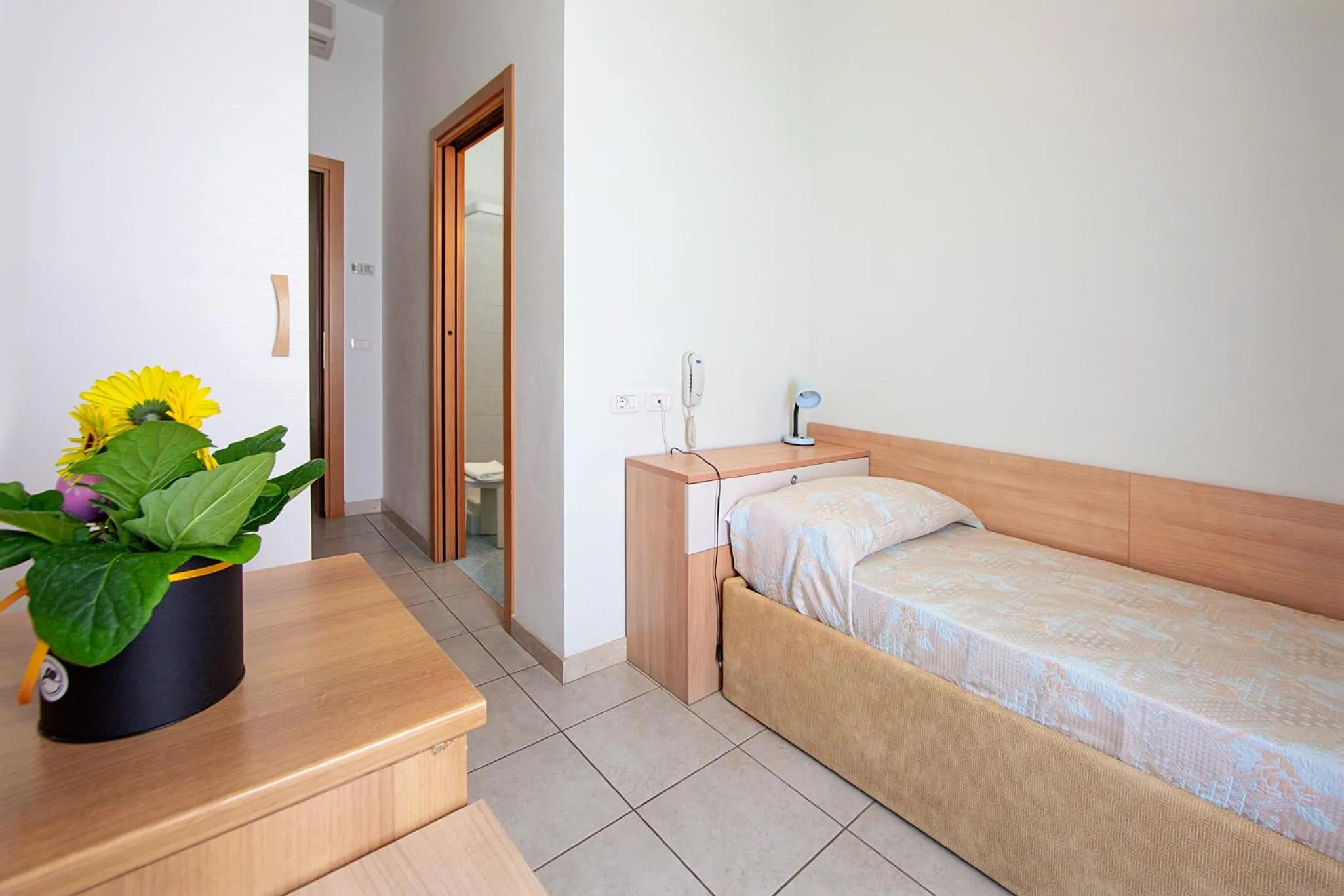 Bed in Hotel Ginevra