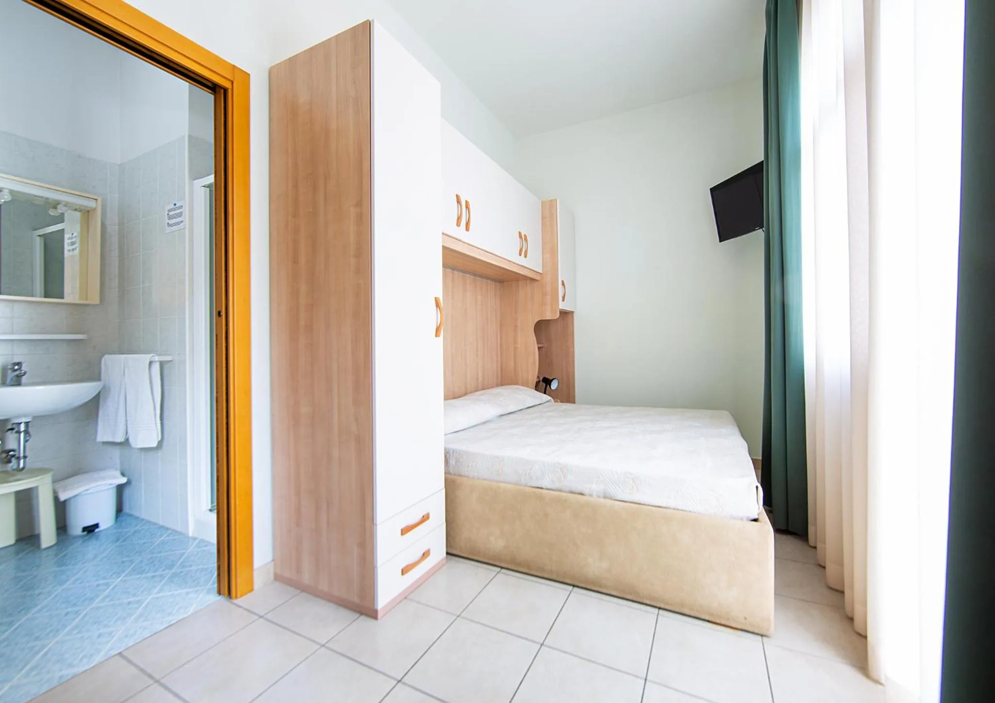 Bed in Hotel Ginevra