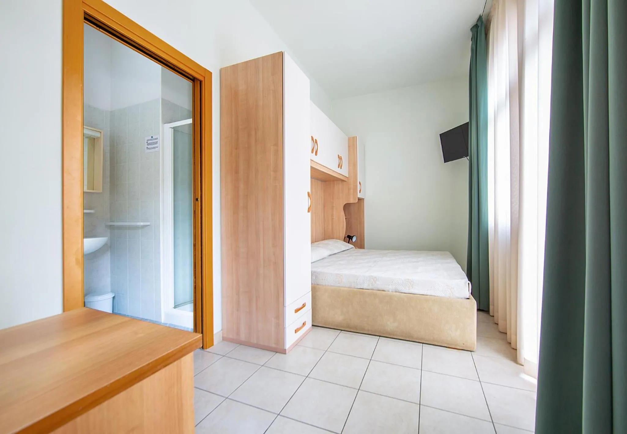 Bed in Hotel Ginevra
