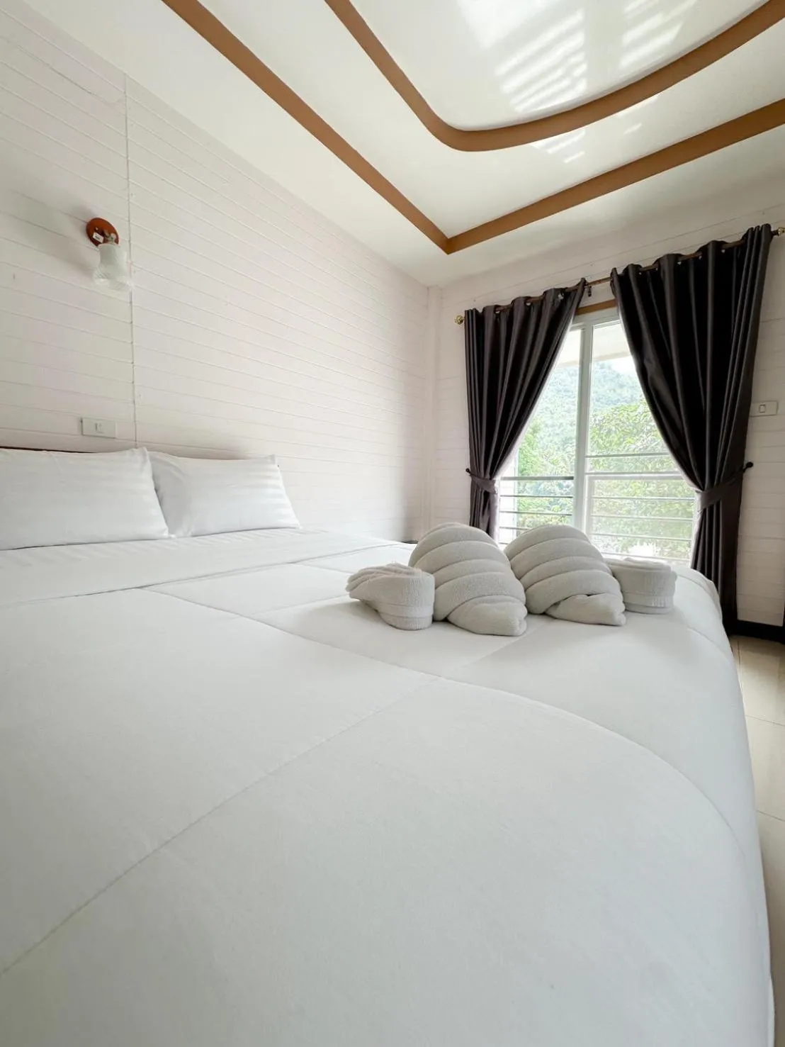 Bed in ชอว์ งาทอง รีสอร์ต Chor Ngar Thong Erawan Kanchanaburi