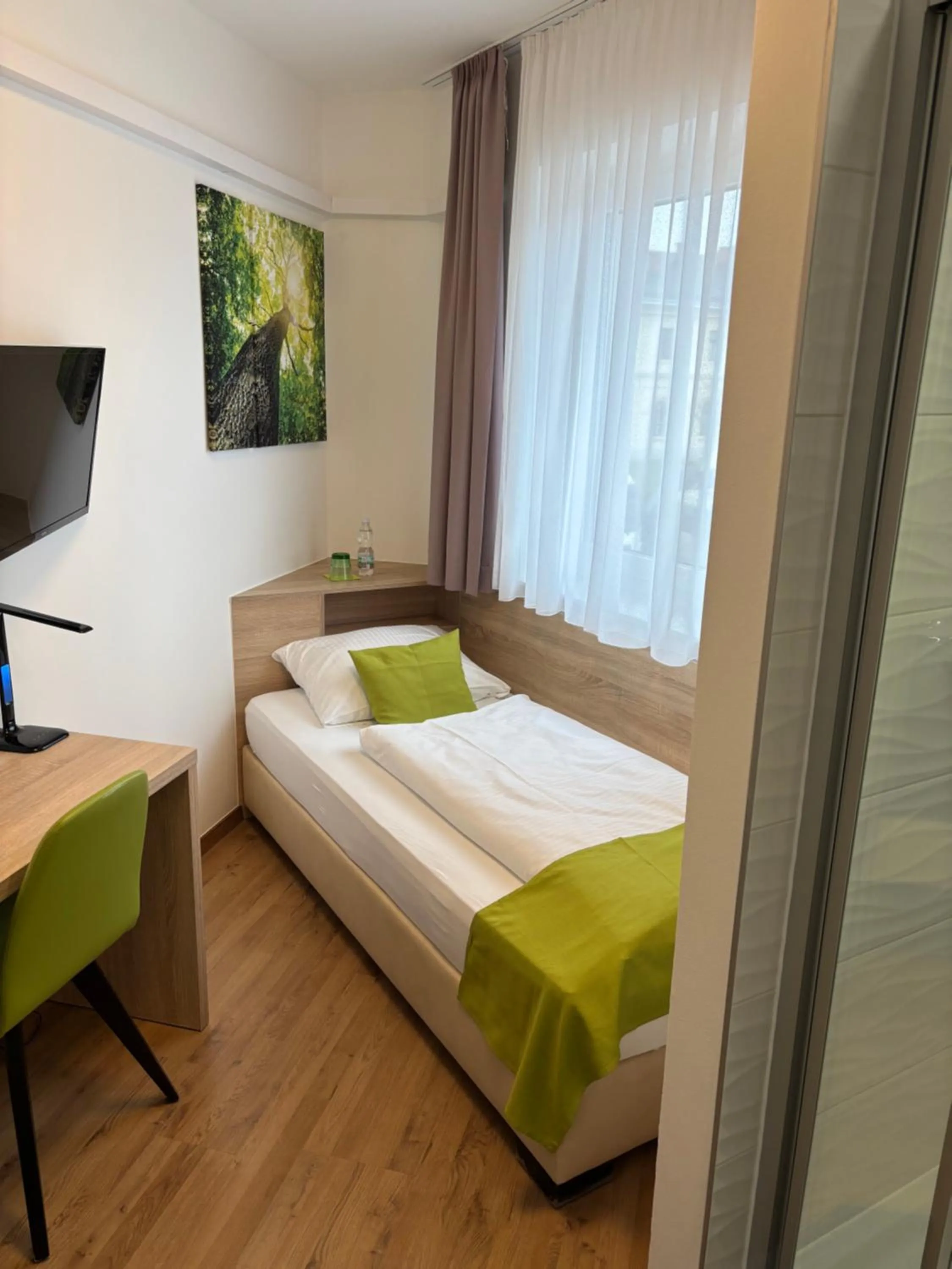 Bed in Hotel Garni Ilys Inn