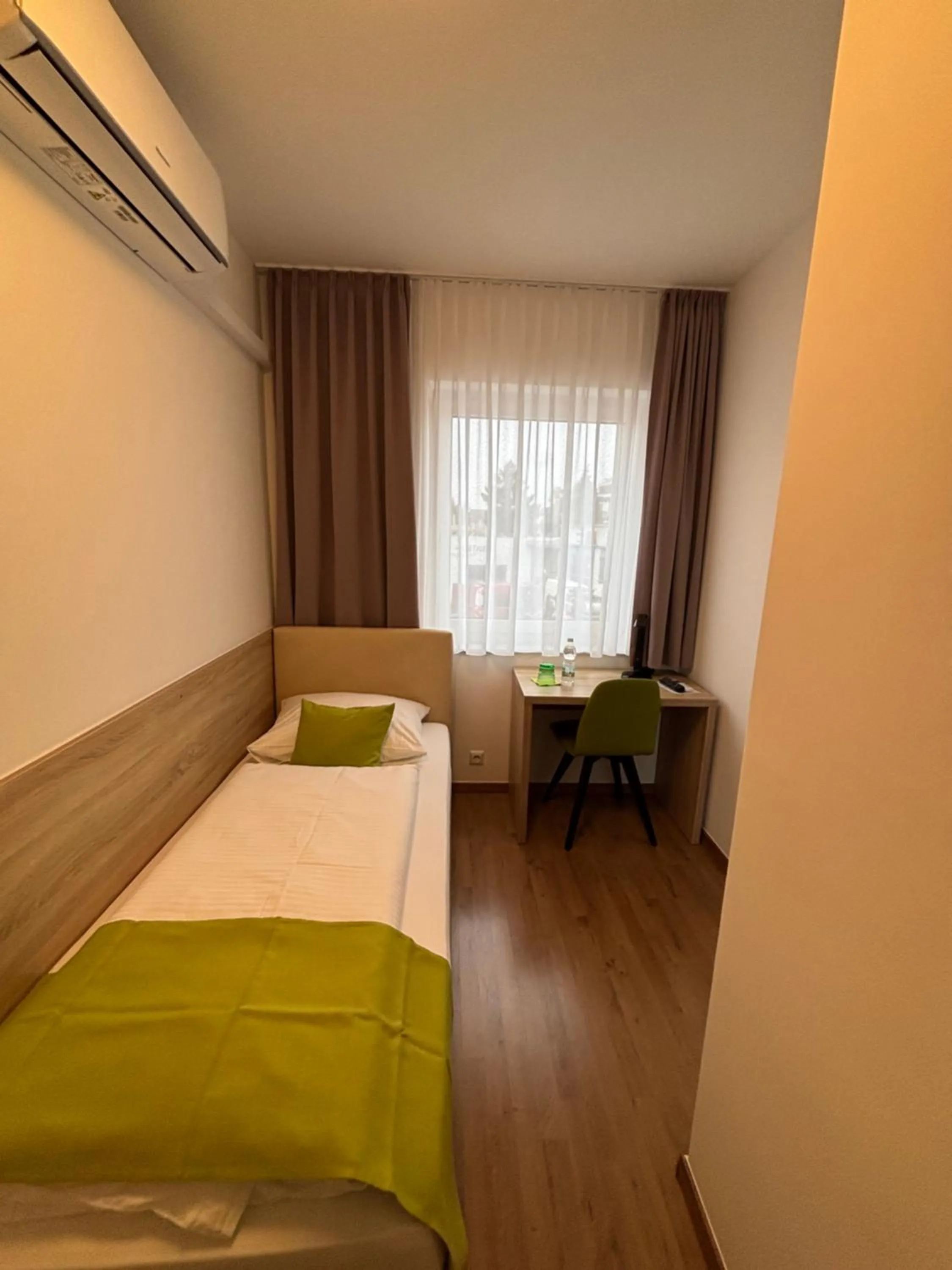 Bed in Hotel Garni Ilys Inn