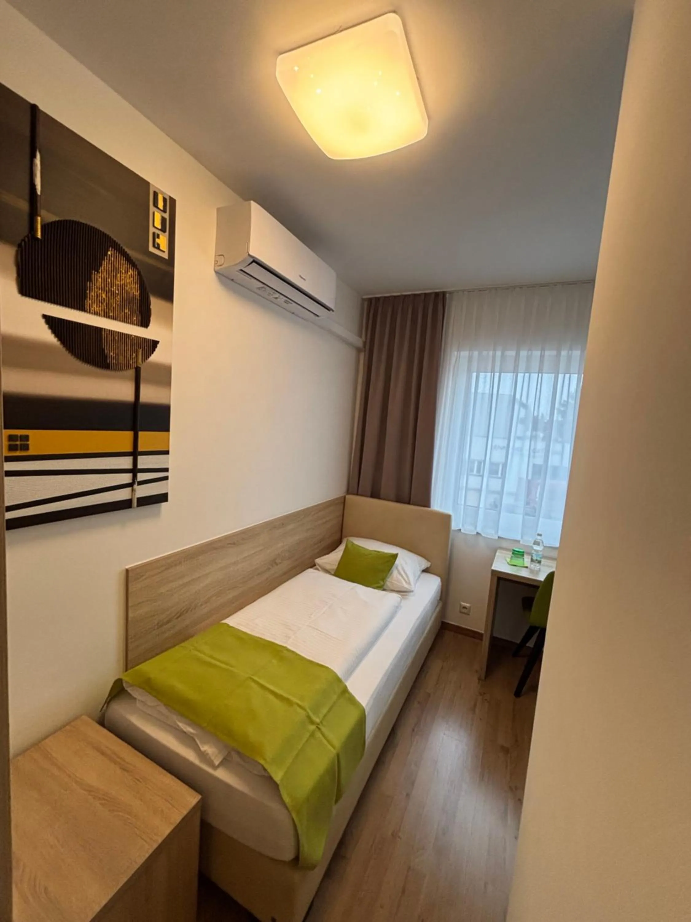 Bed in Hotel Garni Ilys Inn