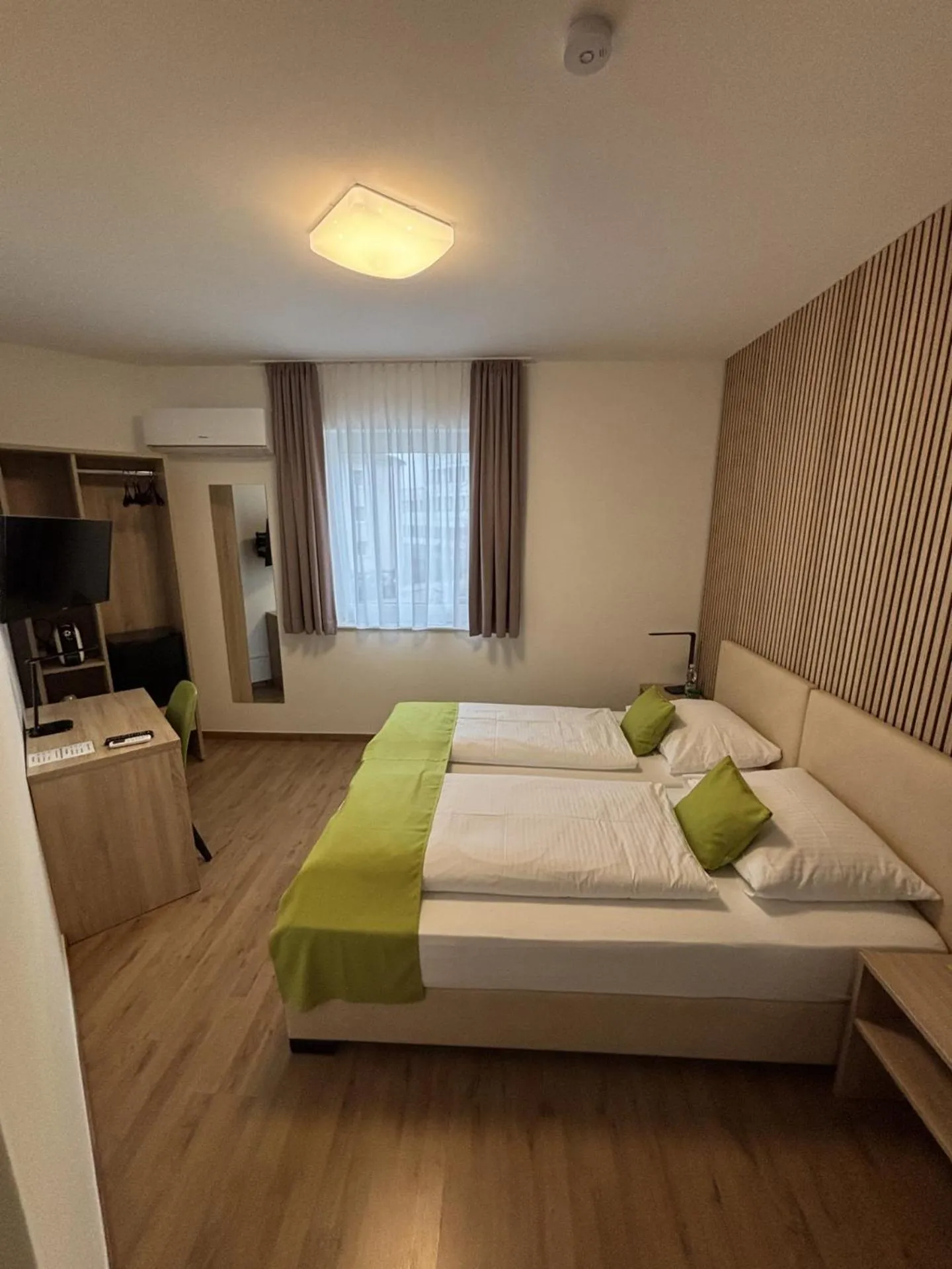 Bed in Hotel Garni Ilys Inn