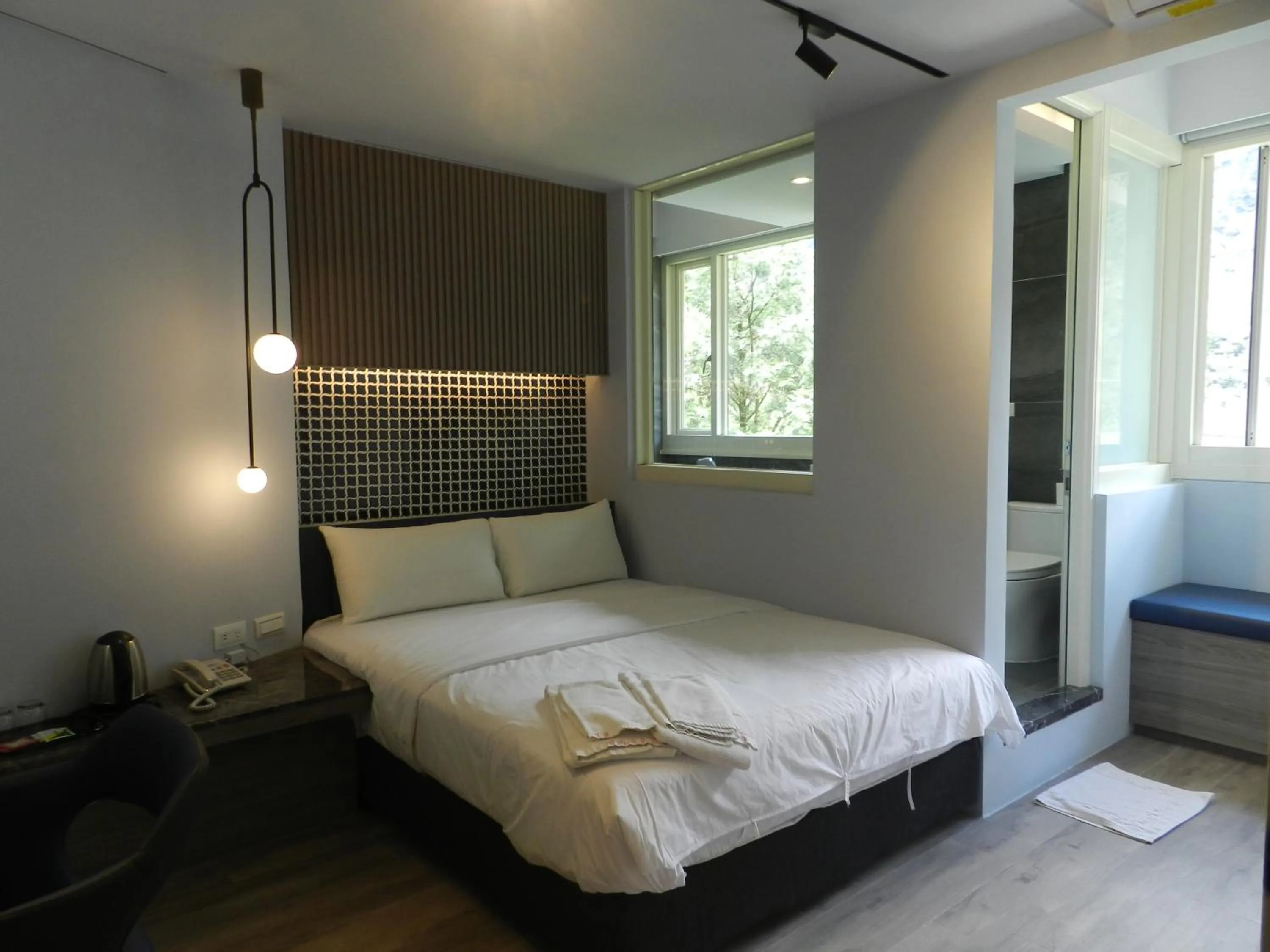 Bed in 谷關明高溫泉 Mingao Hot Spring Resort