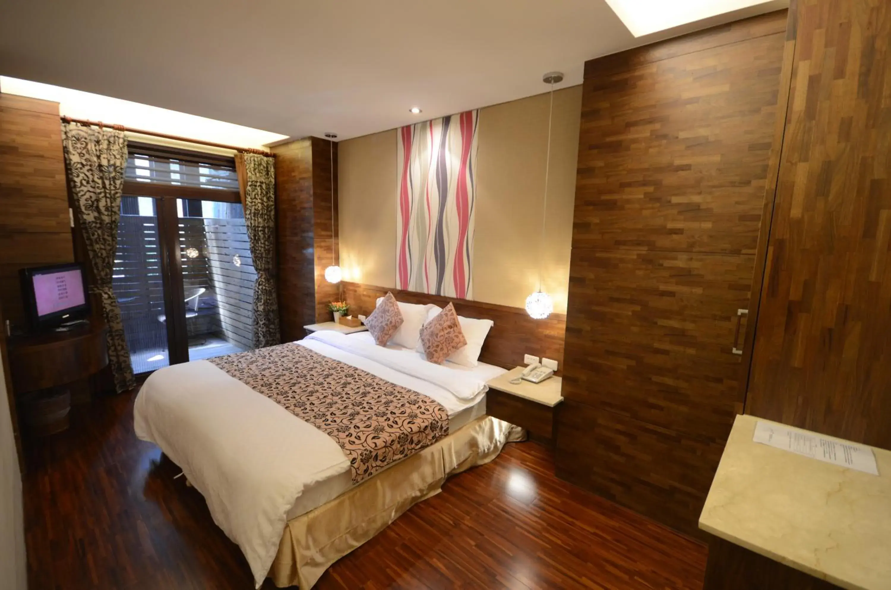 Bed in 谷關明高溫泉 Mingao Hot Spring Resort Bed in 谷關明高溫泉 Mingao Hot Spring Resort