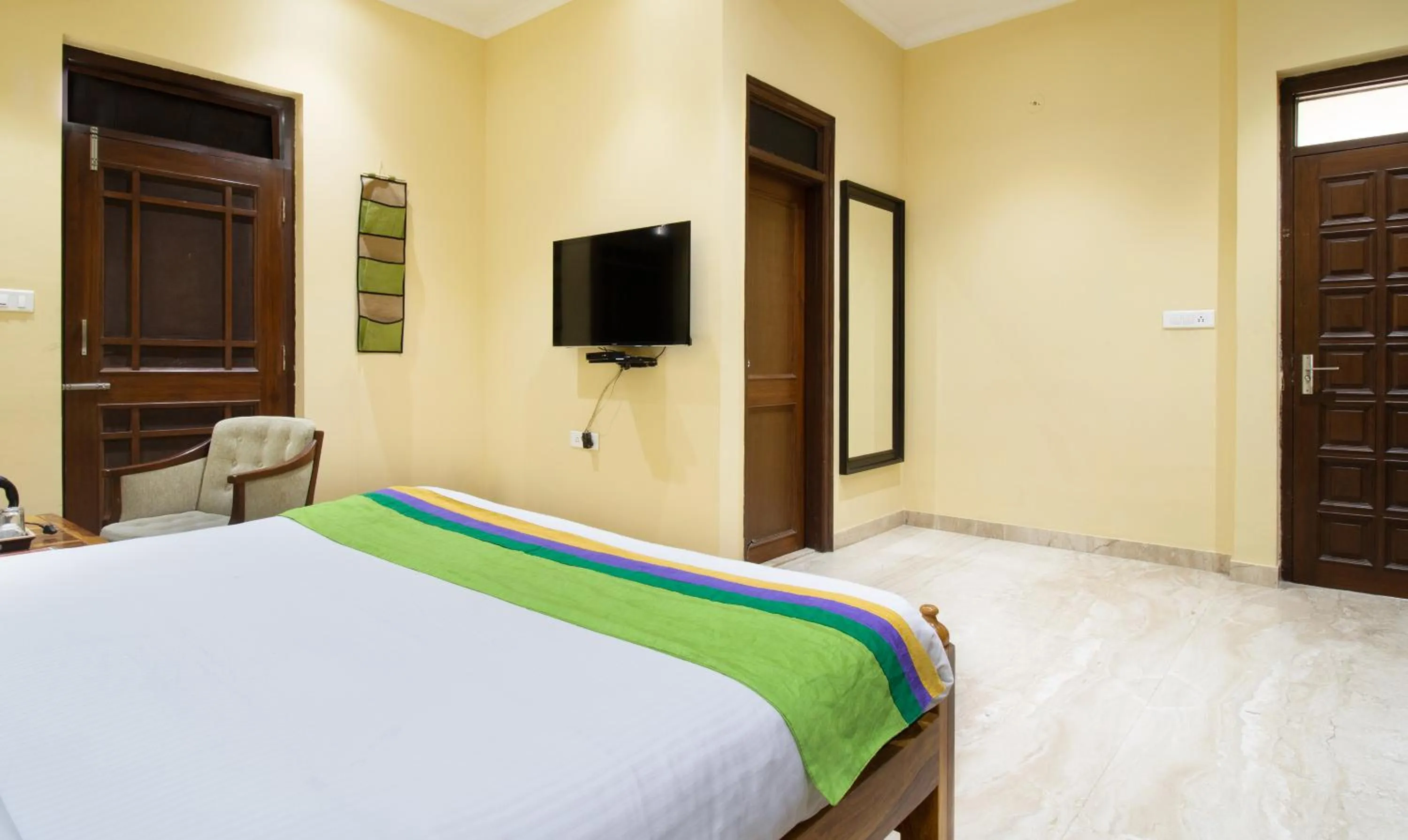 Bedroom, Bed in Treebo The Anchorage Malviya Nagar