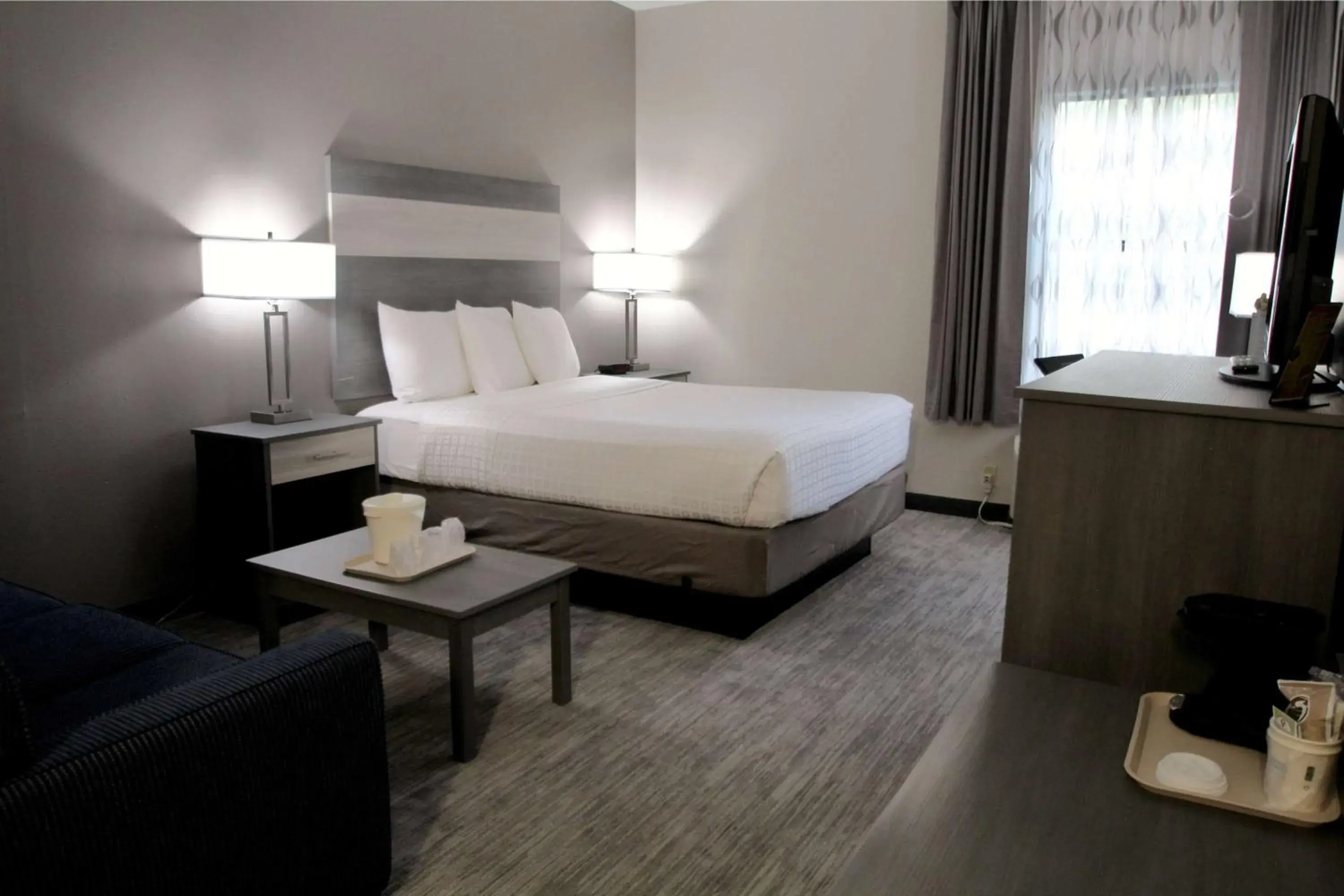 Photo of the whole room, Bed in Baymont by Wyndham Lafayette - Purdue University Photo of the whole room, Bed in Baymont by Wyndham Lafayette - Purdue University