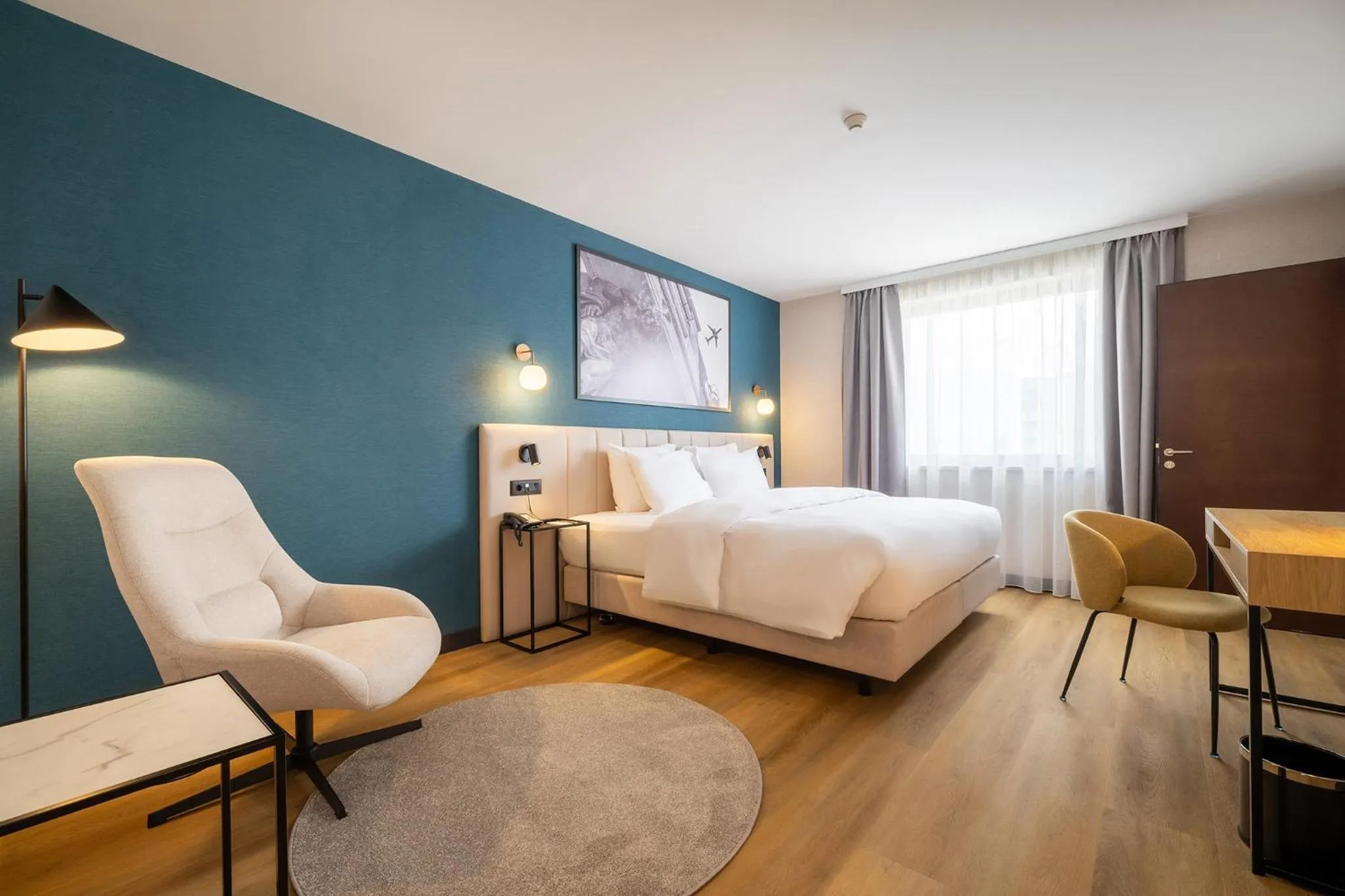 Seating area, Bed in Metropolitan Hotel Sofia, a member of Radisson Individuals