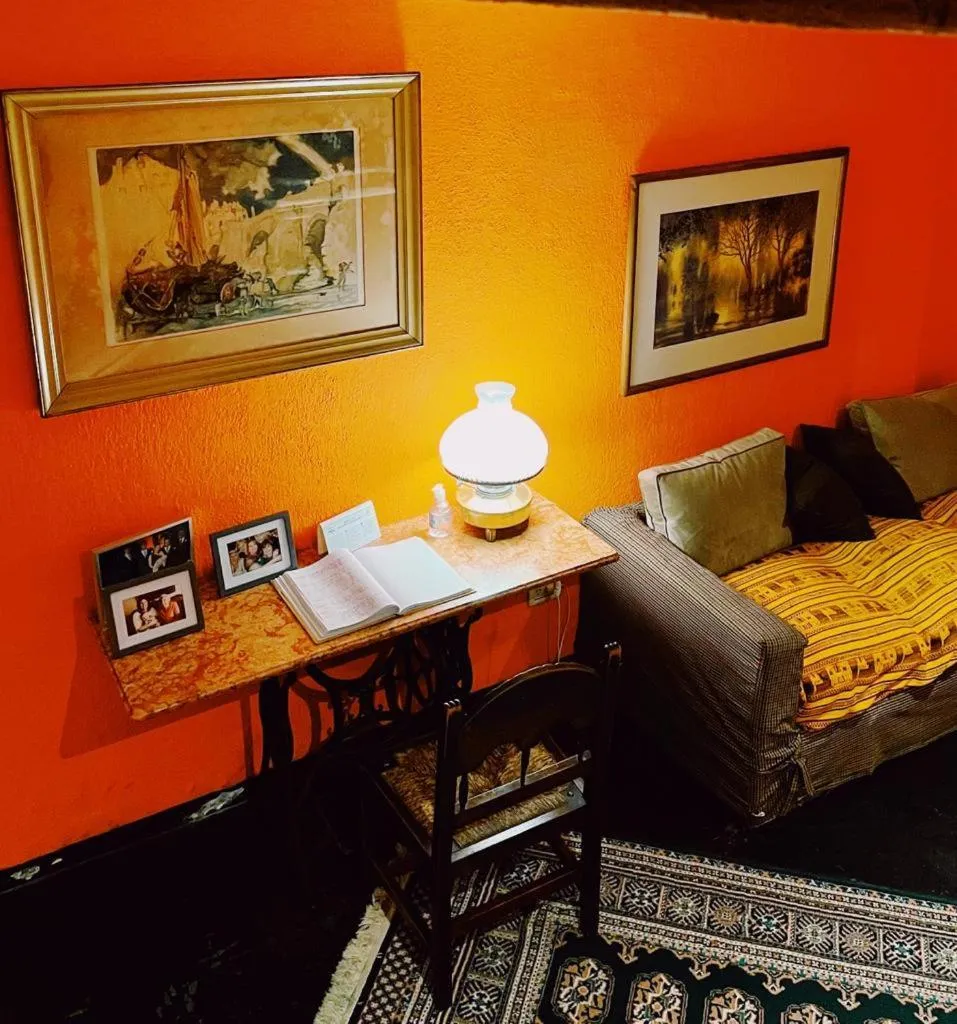 Living room, Bed in Posada Del Fin Del Mundo