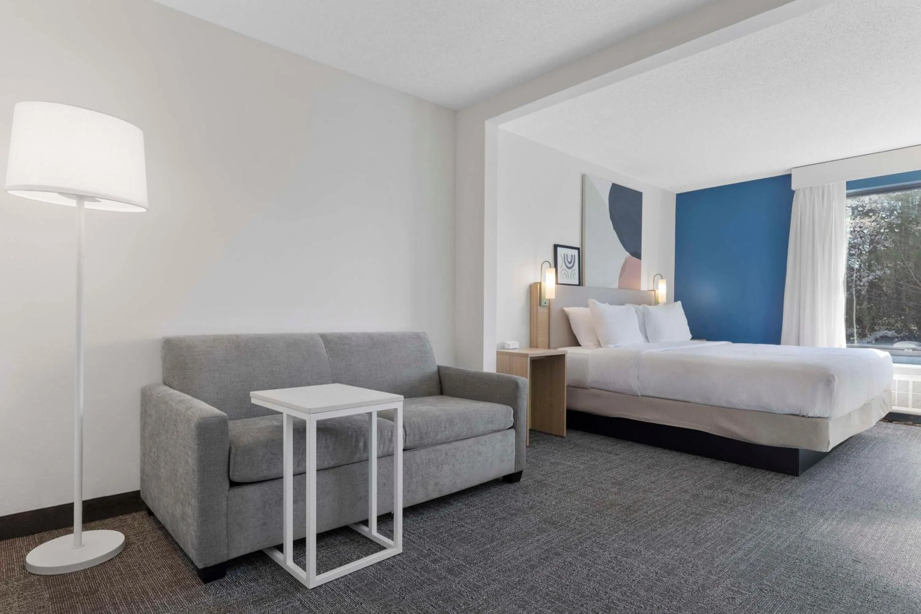 Living room, Bed in Spark By Hilton Greensboro