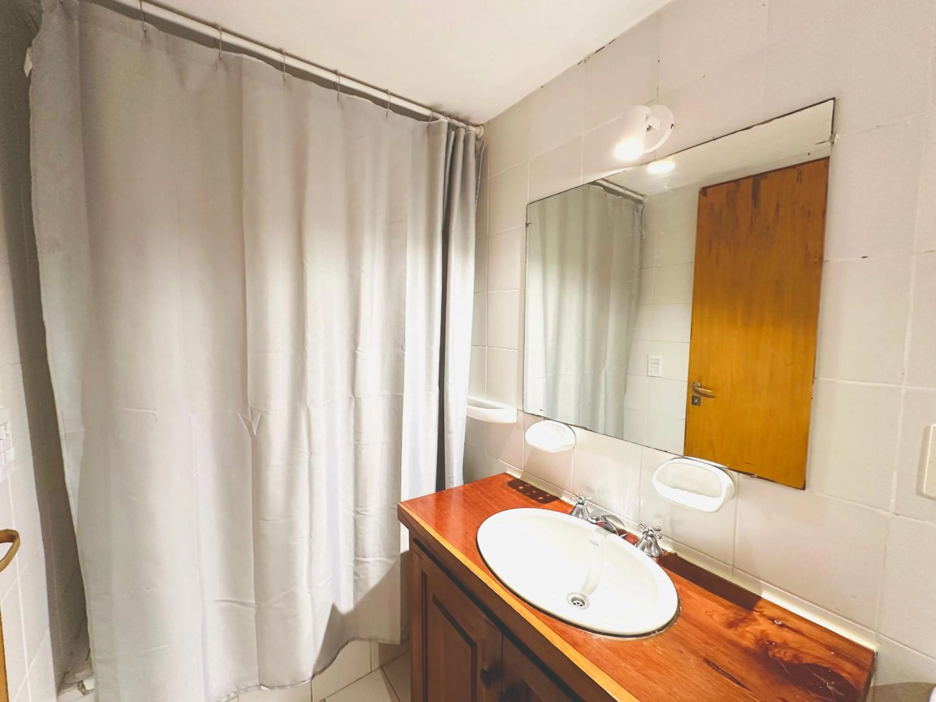 Bathroom, Bed in Hosteria Ventus Patagonia