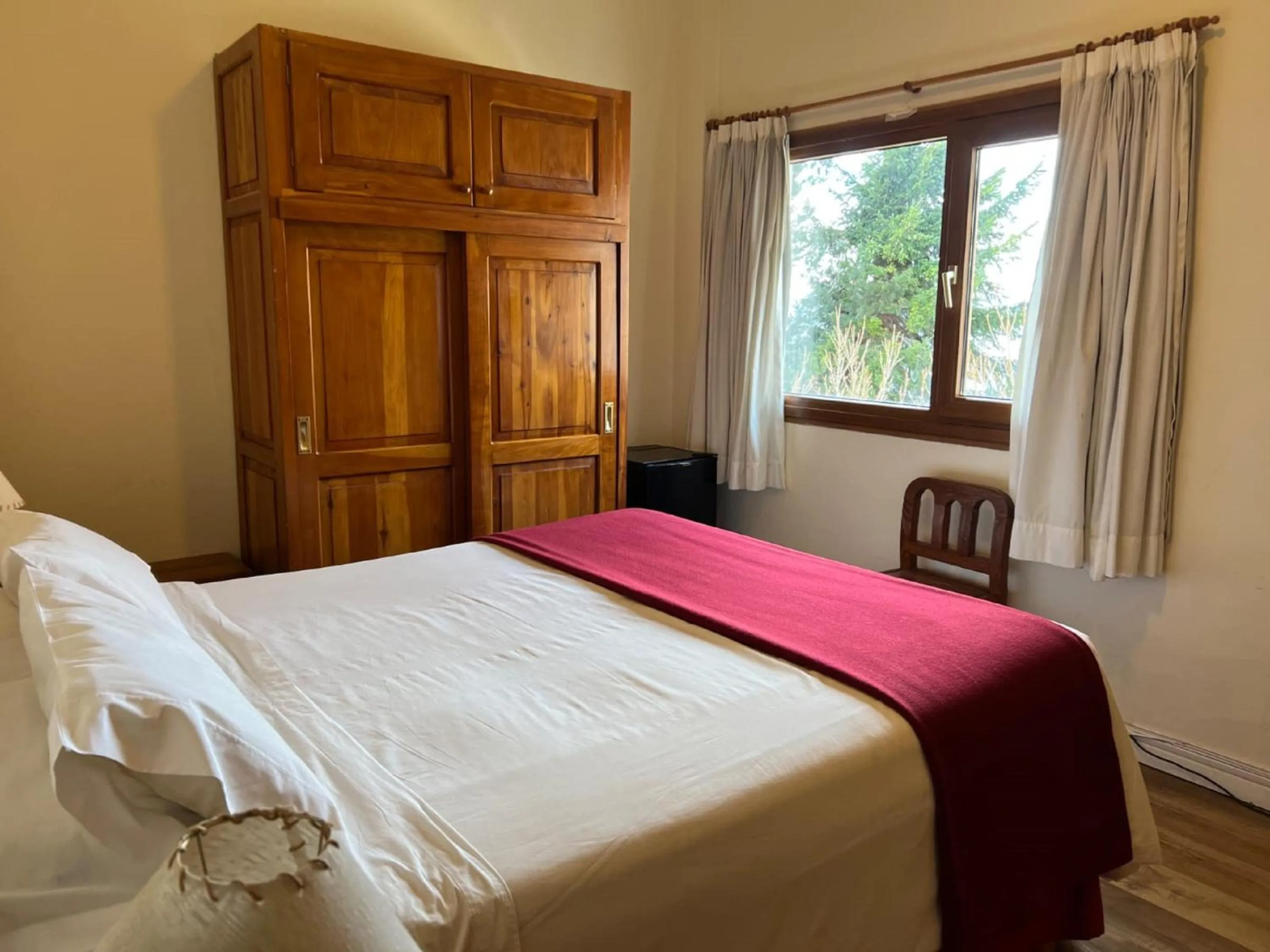 Bedroom, Bed in Hostería Nórdico Lake