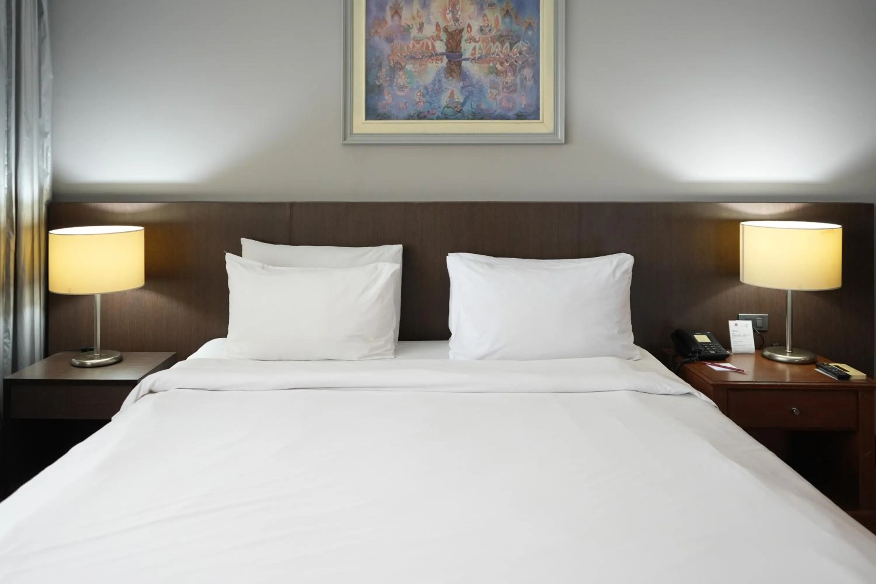 Bed in Royal Suite Hotel Bangkok