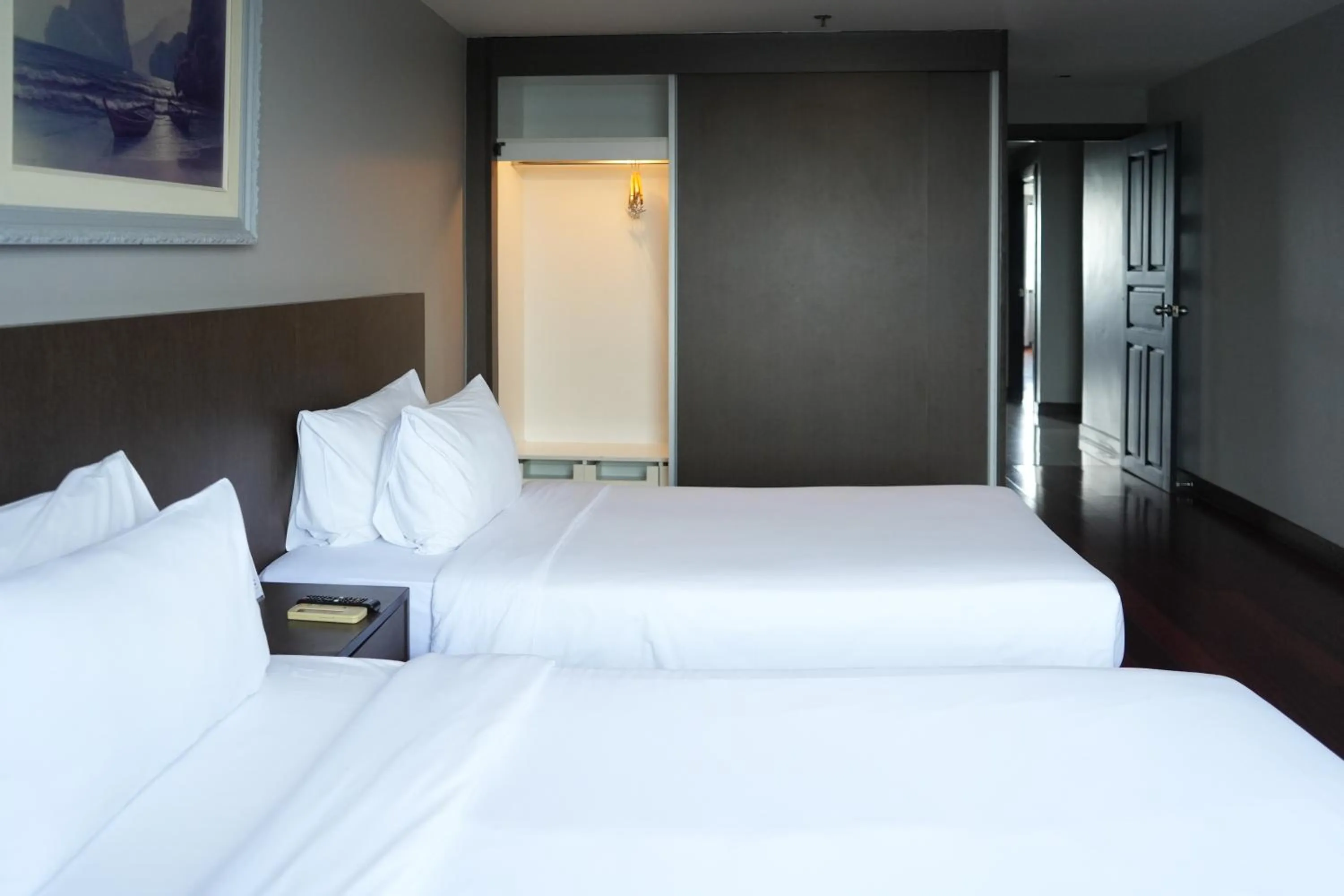 Bed in Royal Suite Hotel Bangkok