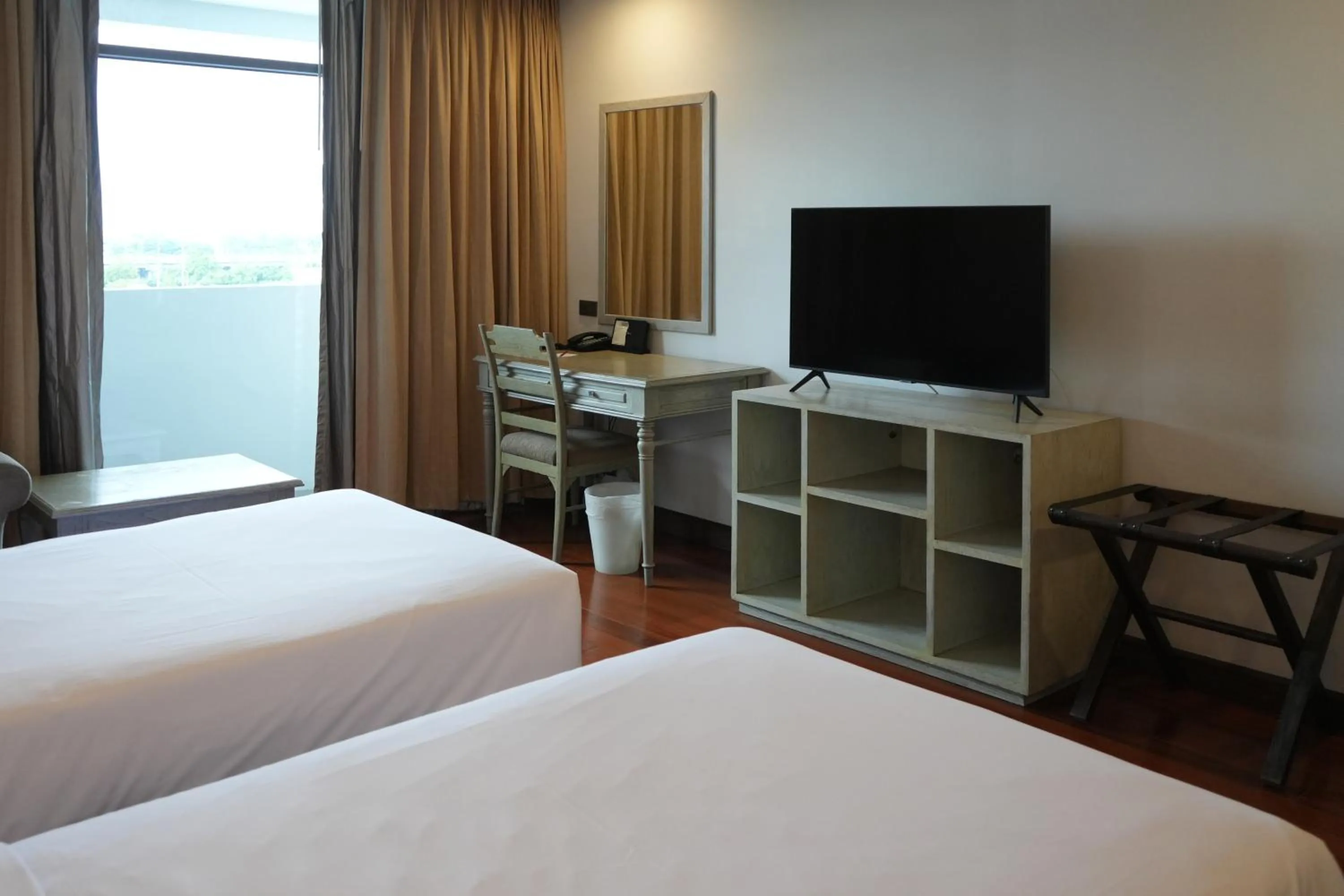 Bed in Royal Suite Hotel Bangkok