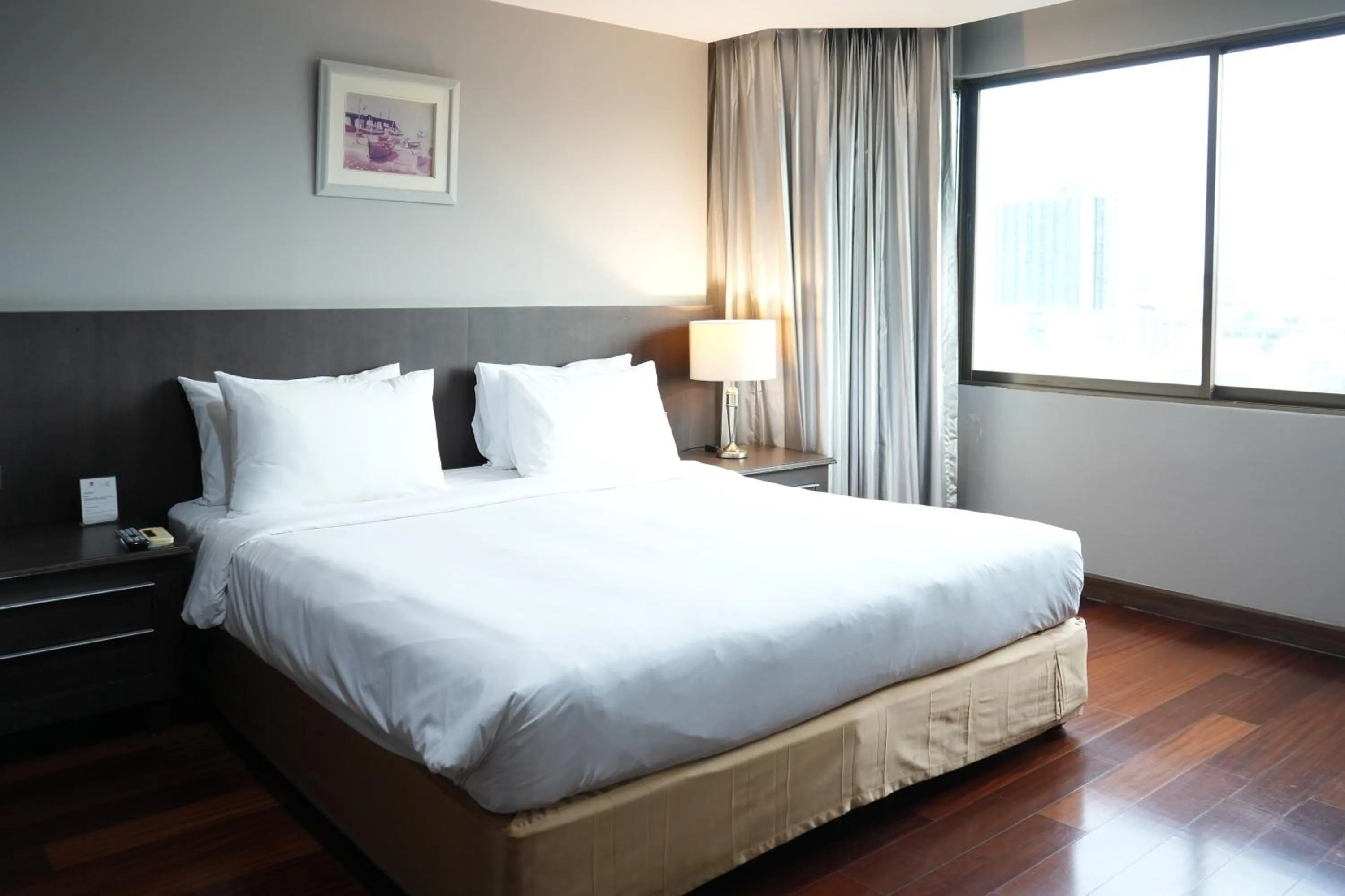 Bed in Royal Suite Hotel Bangkok