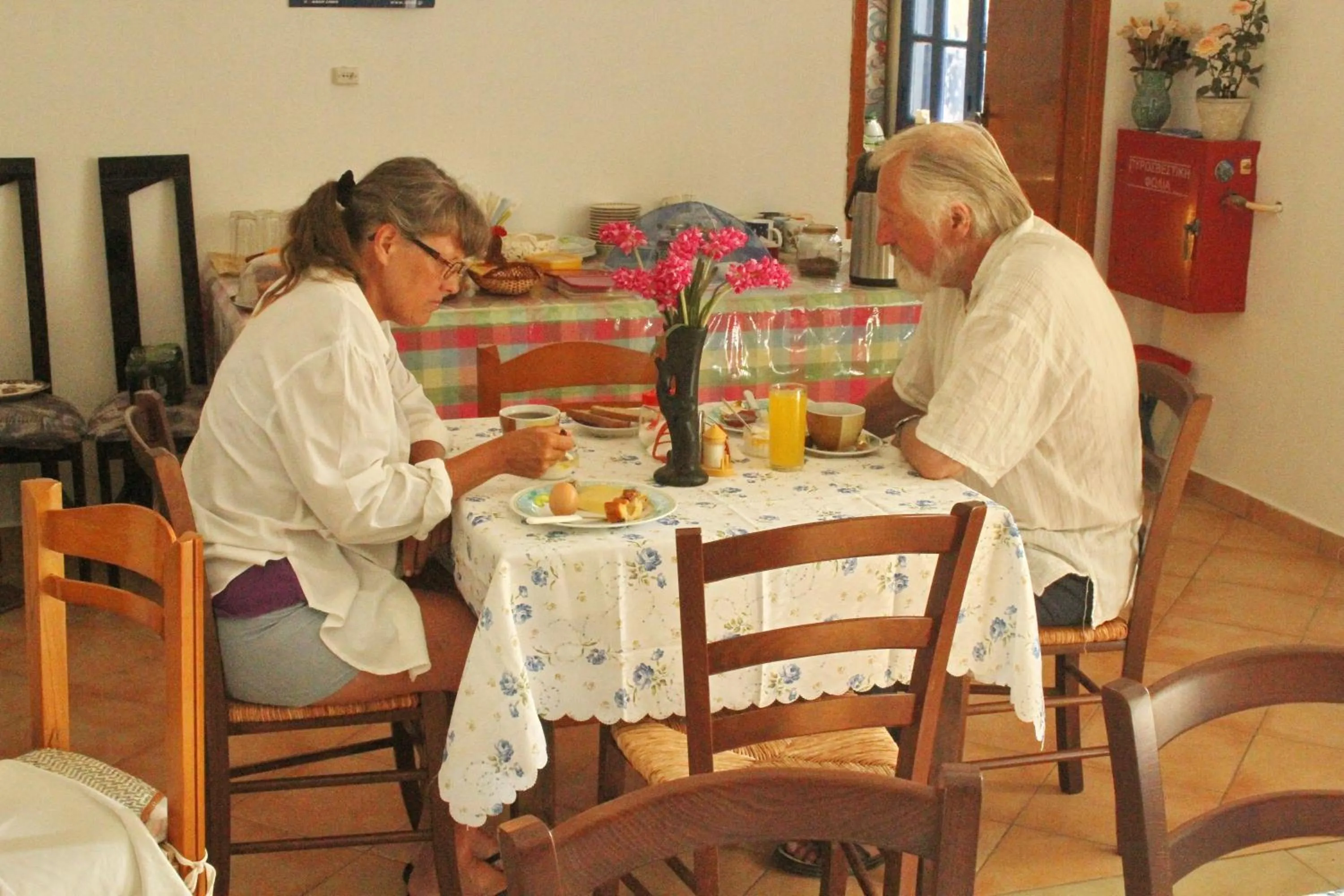 Dining area in Nikos Hotel