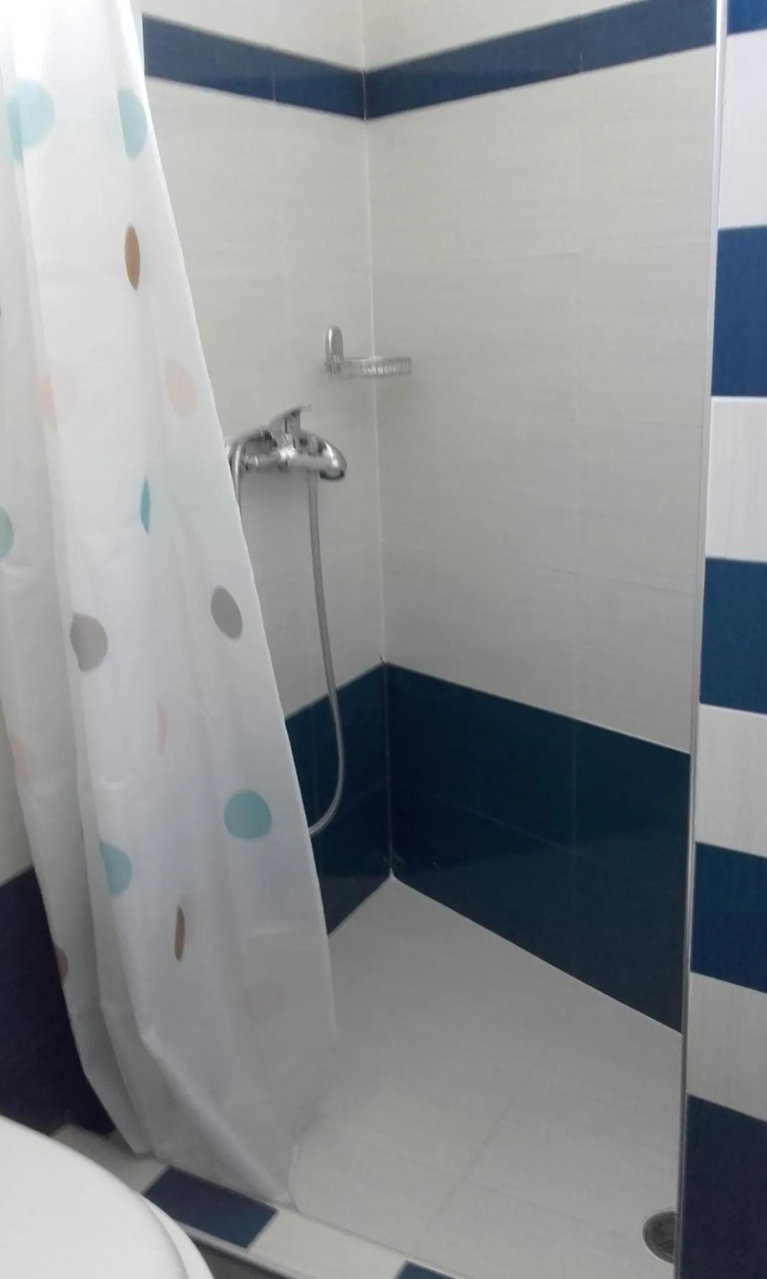 Bathroom in Nikos Hotel