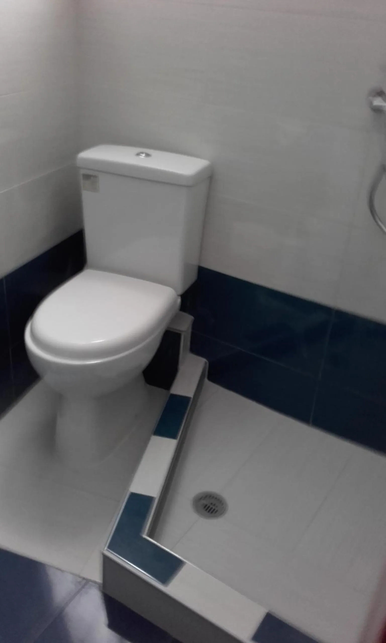 Bathroom in Nikos Hotel