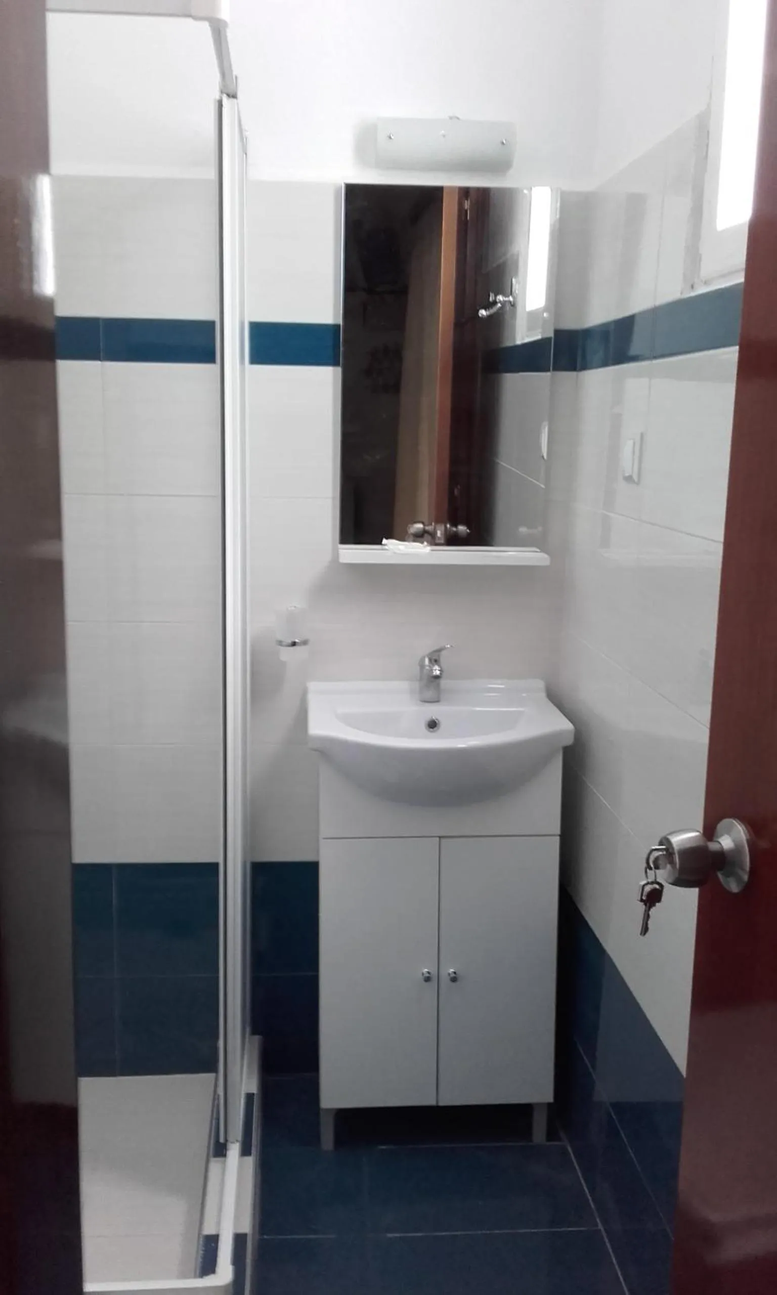 Bathroom in Nikos Hotel