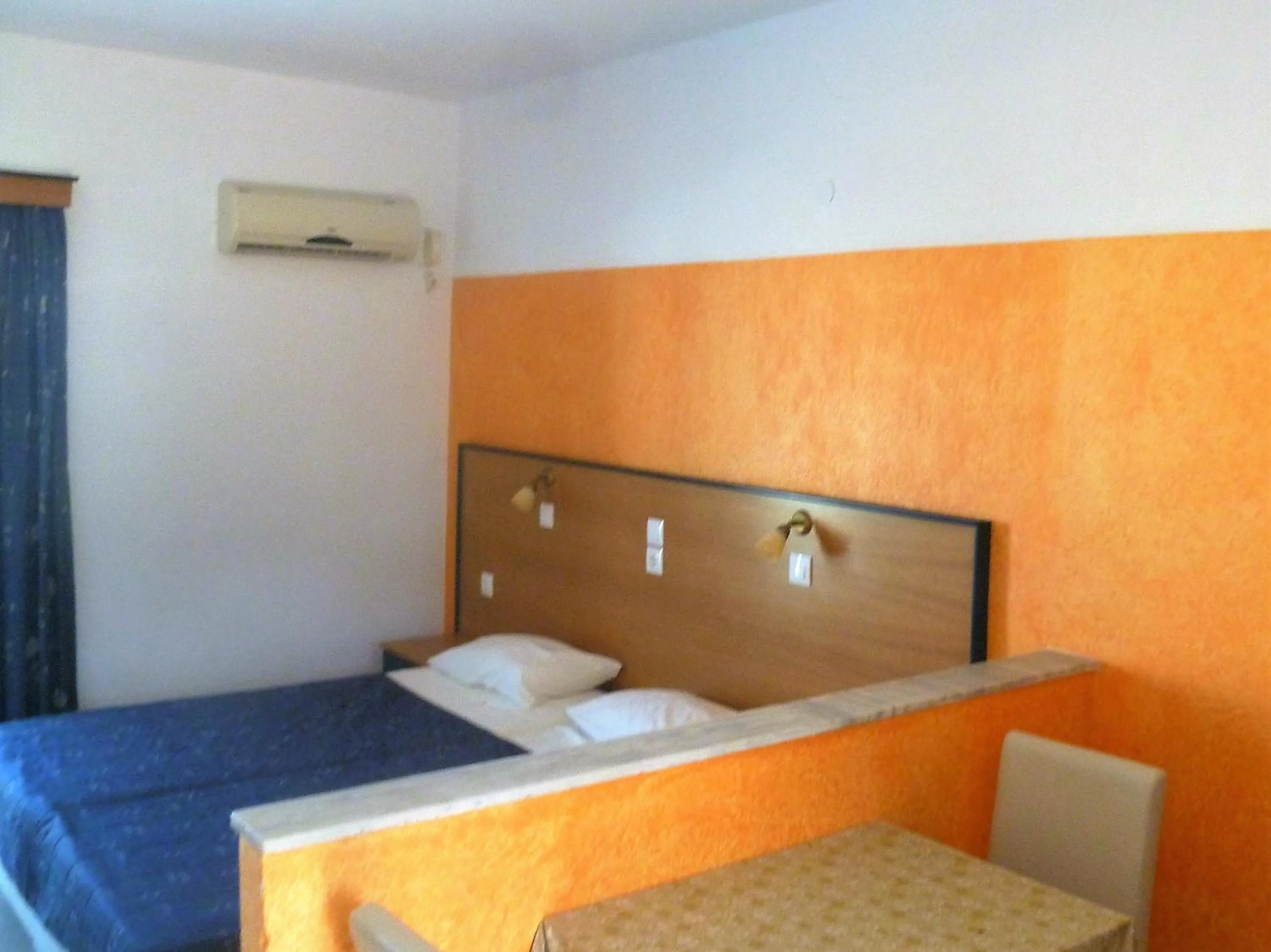 Dining area, Bed in Paraschos Studios Kos