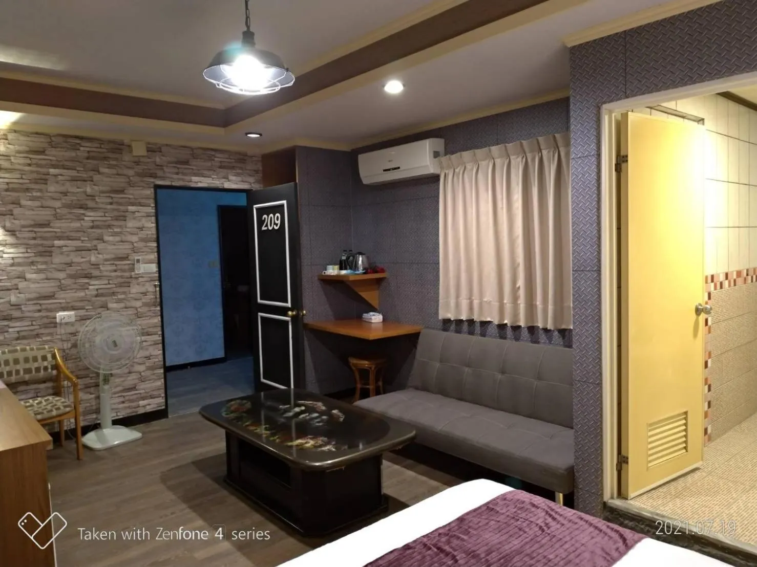 Living room, Bed in Guan Lun Hotel