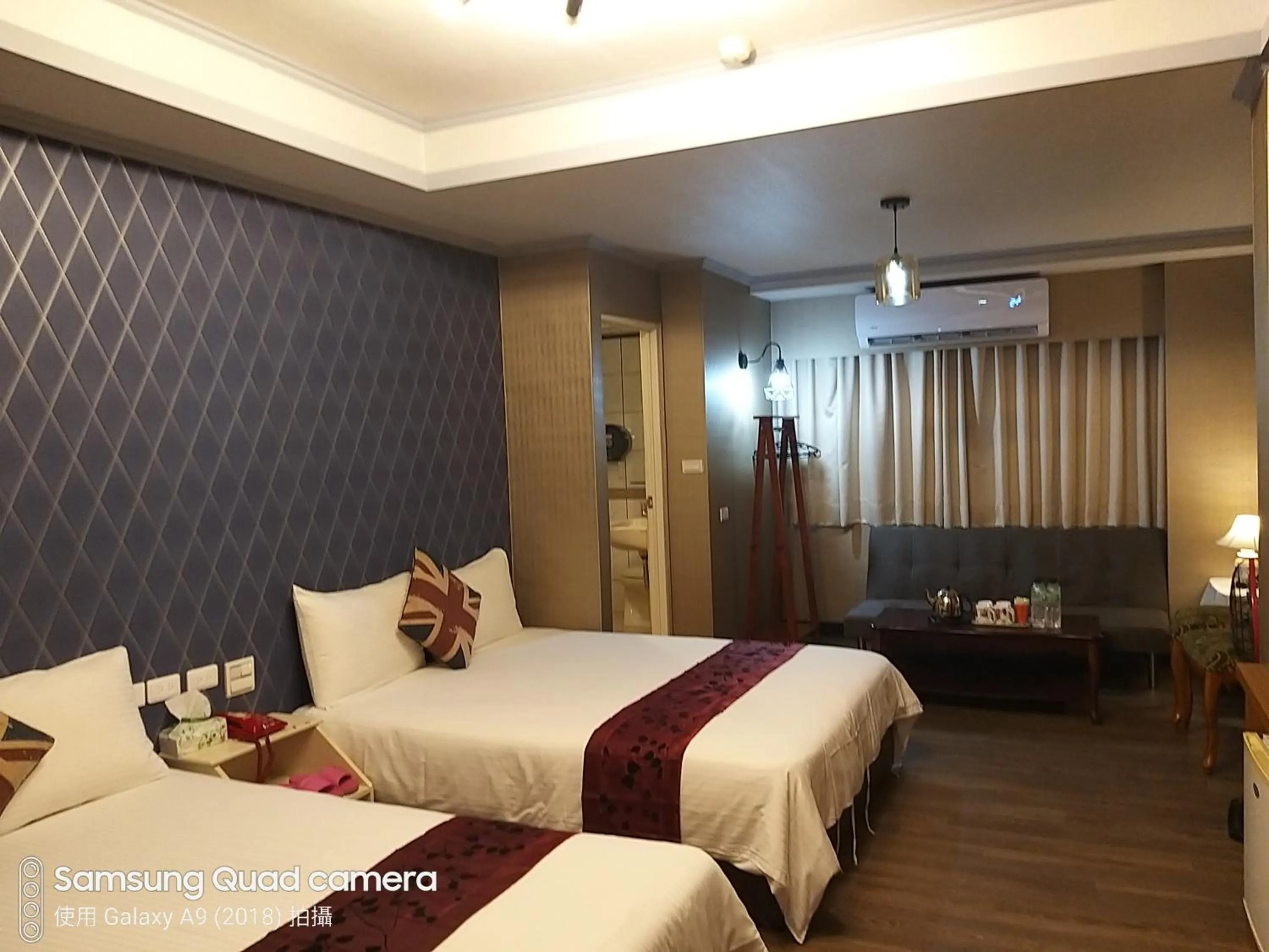 Bed in Guan Lun Hotel