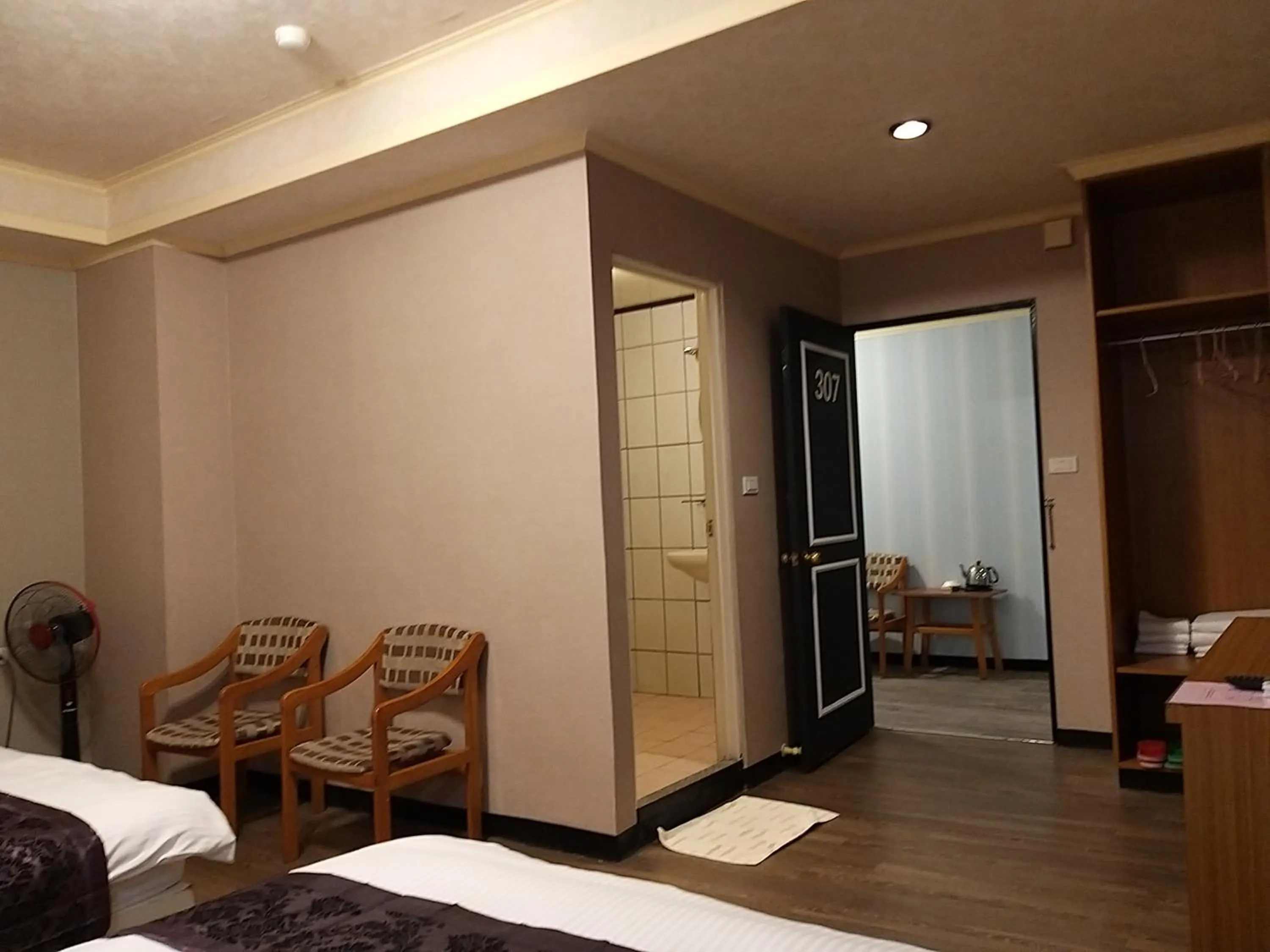 Living room, Bed in Guan Lun Hotel