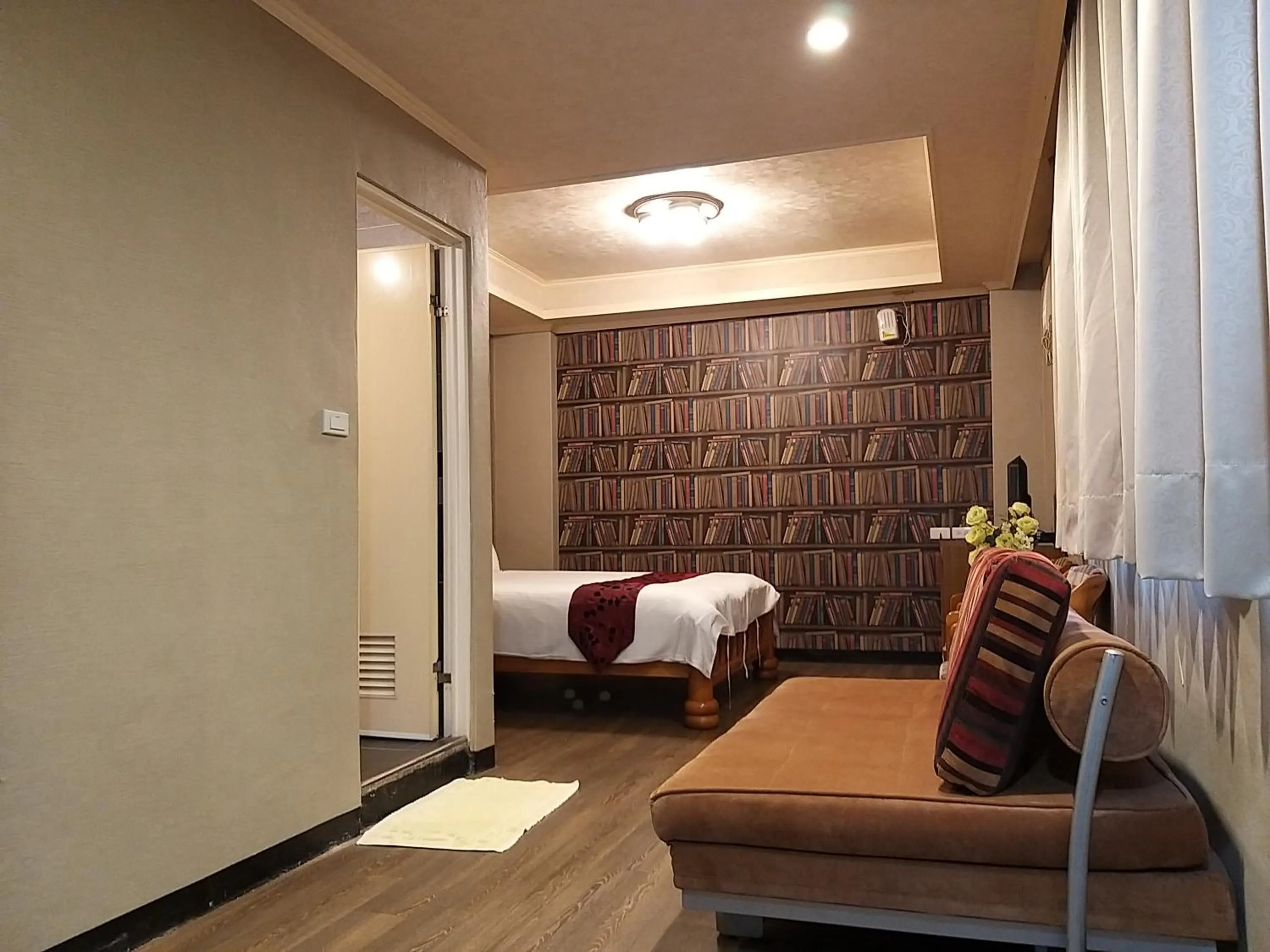 Seating area, Bed in Guan Lun Hotel