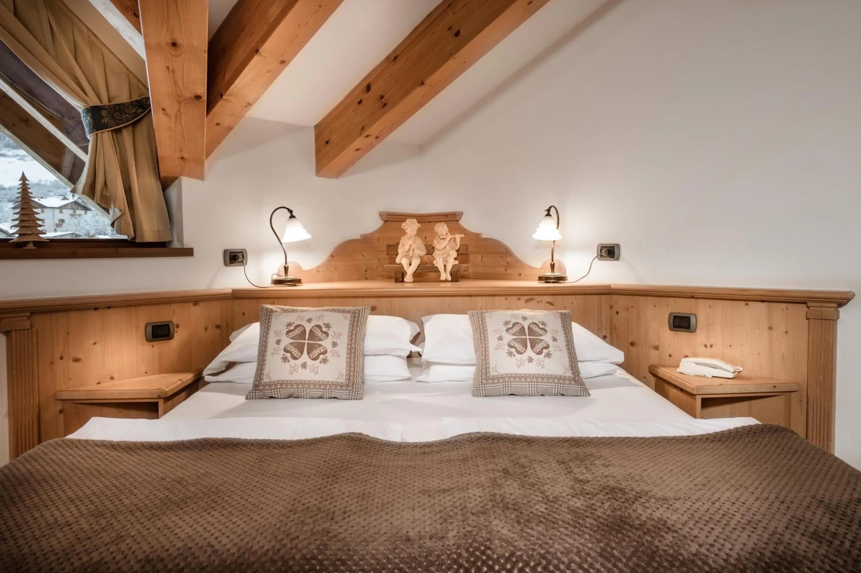 Bed in Family Hotel Serena