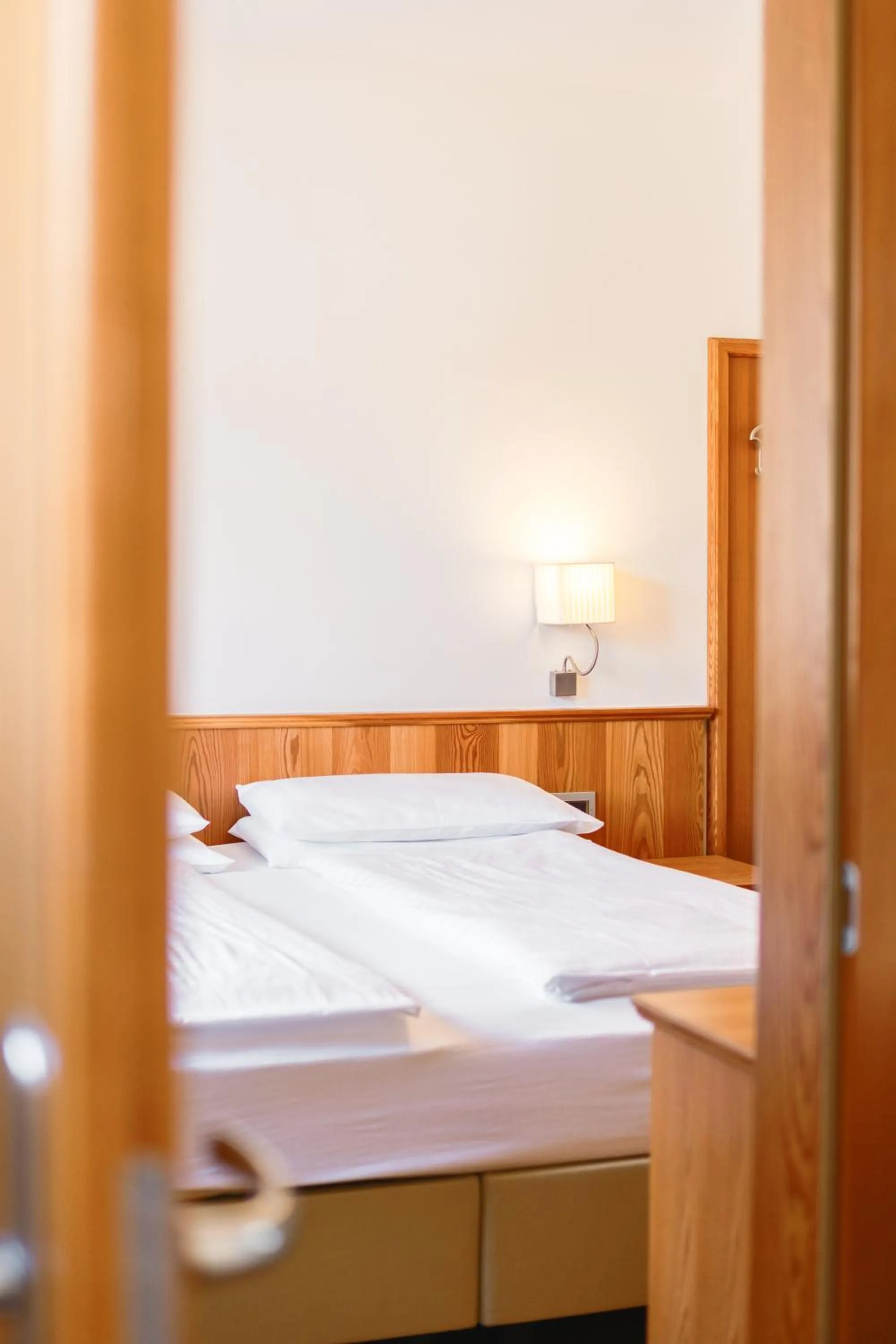 Bed in Family Hotel Serena