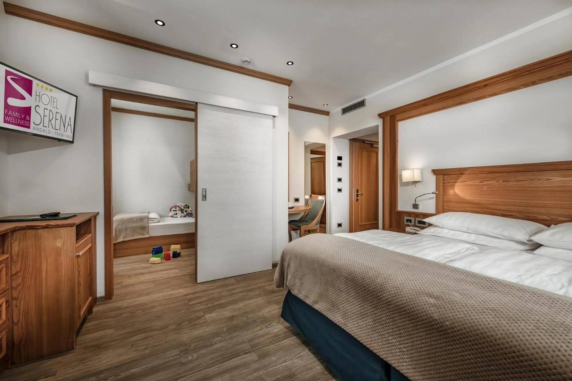 Bed in Family Hotel Serena