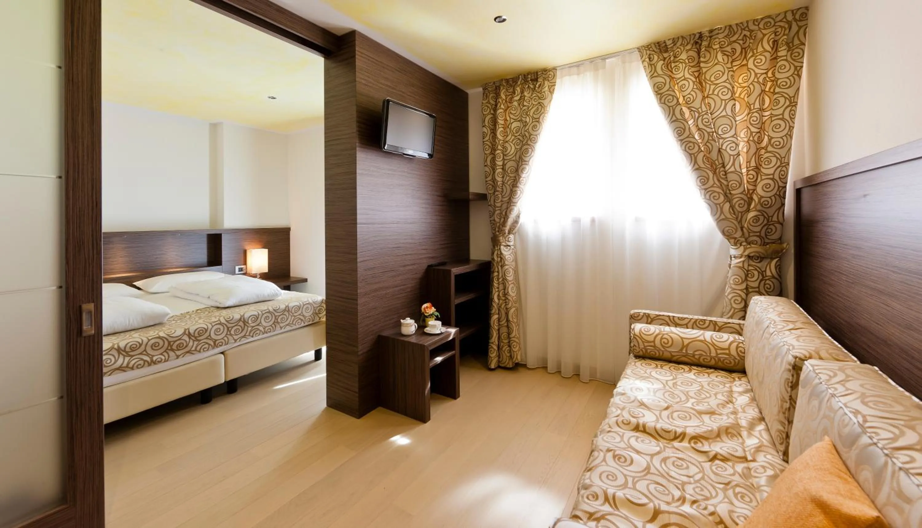 Photo of the whole room, Bed in Family Hotel Serena